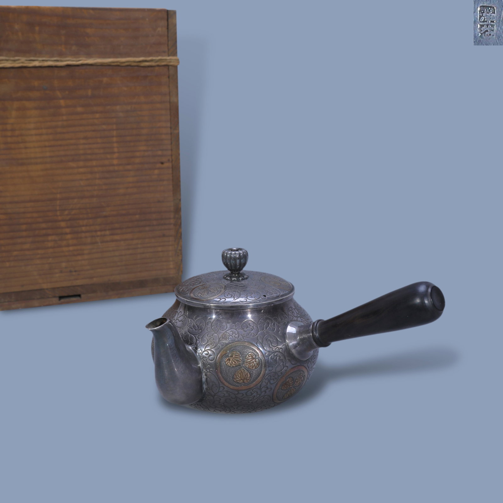 Side-handled silver teapot with gilded leaf patterns: H:7.5cm W:15.5cm Wt:225g