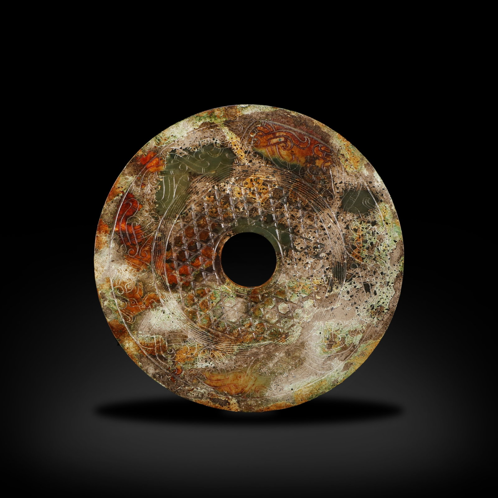 Warring States Period: Jade bi with dragon patterns: D:14.1cm