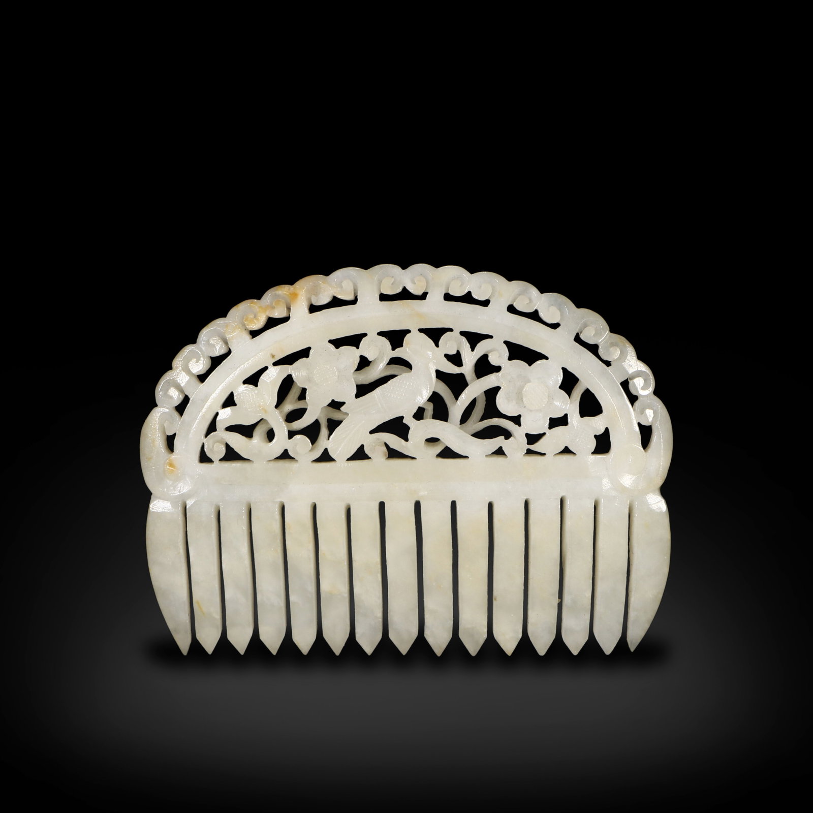 Ming Dynasty White jade comb carved with flower and bird patterns: H:5.7cm W:7.7cm