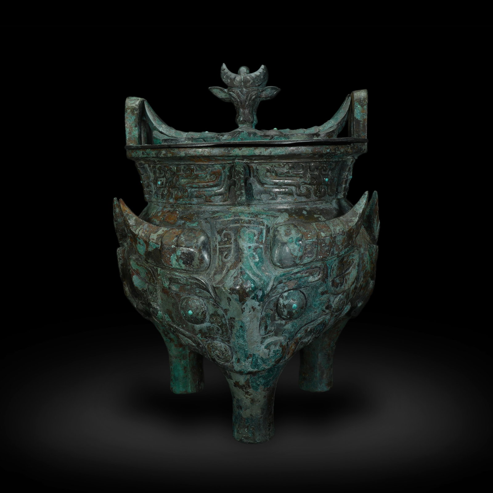 Western Zhou Dynasty Bronze Li Tripod with Animal Mask: H:32.5cm W:24.6cm