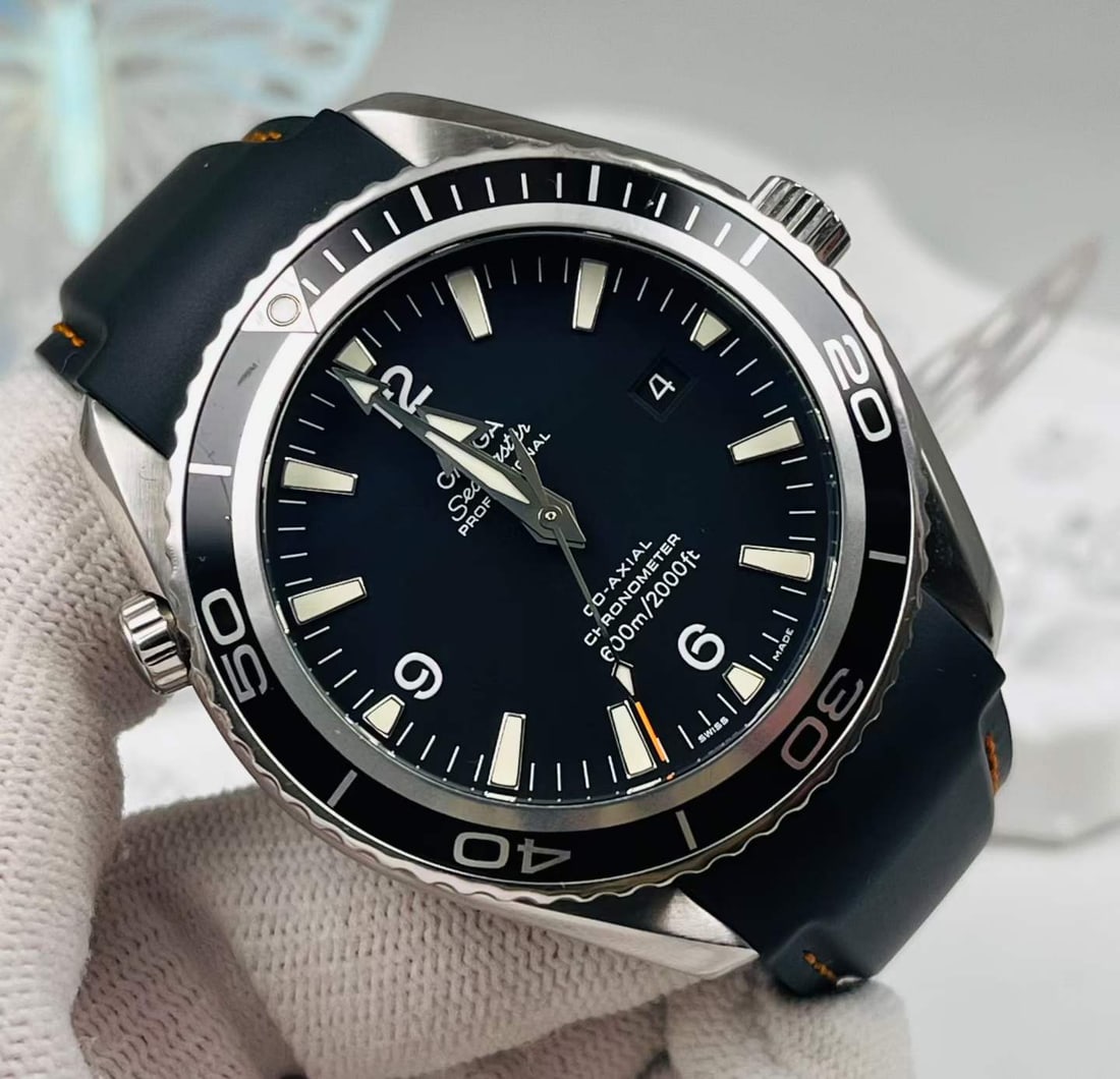 OMEGA SEAMASTER PLANET OCEAN AUTOMATIC MEN'S WATCH: Name Omega Seamaster Planet Ocean Automatic Men's Watch Dimensions The strap is a replacement, and the original factory strap is also included.