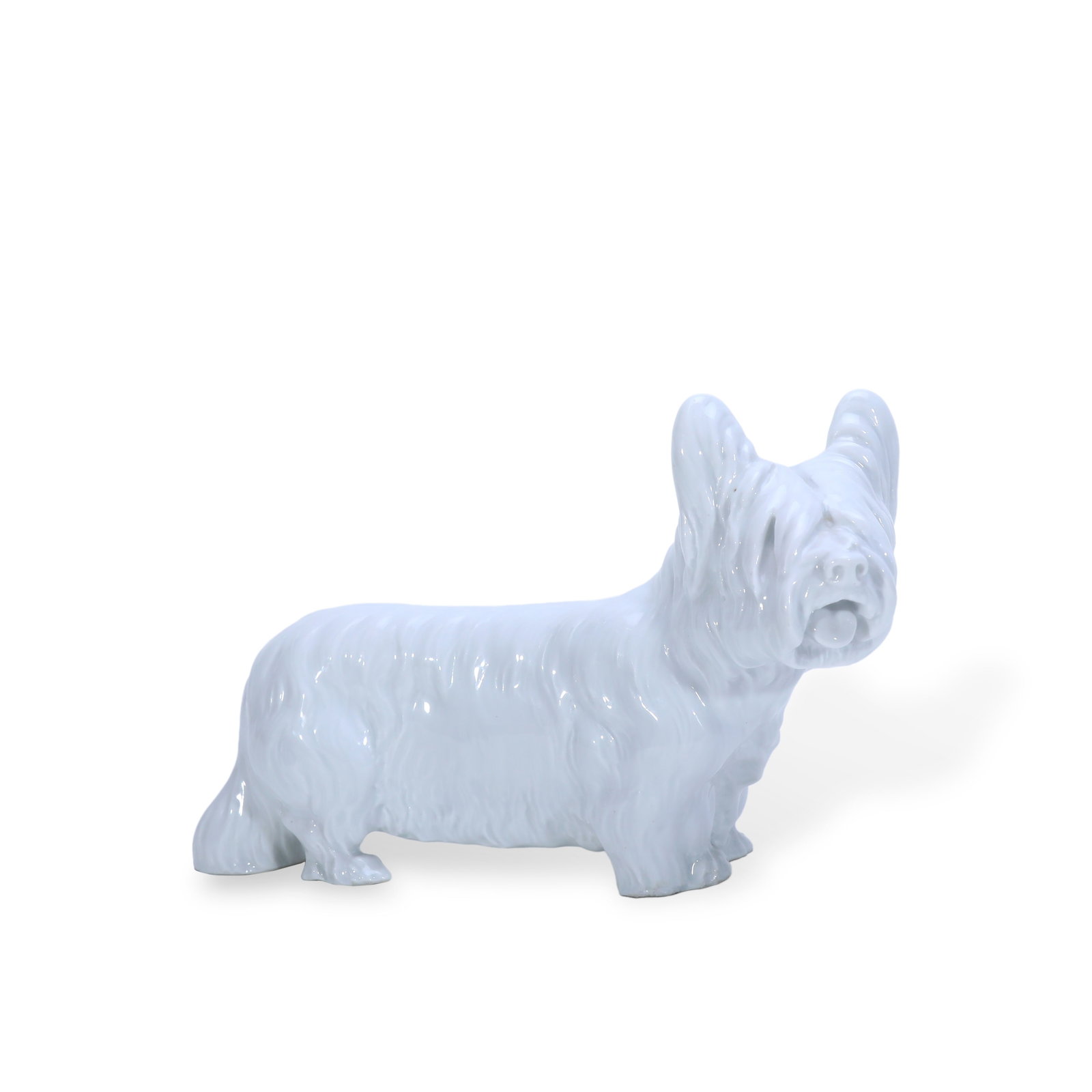 MID-20TH CENTURY WHITE MEISSEN PORCELAIN FIGURINE OF A SKYE TERRIER: Name Mid-20th Century White Meissen Porcelain Figurine of a Skye Terrier Dimensions It belongs to Meissen's classic animal series.The entire figurine is crafted of plain white porcelain without polych