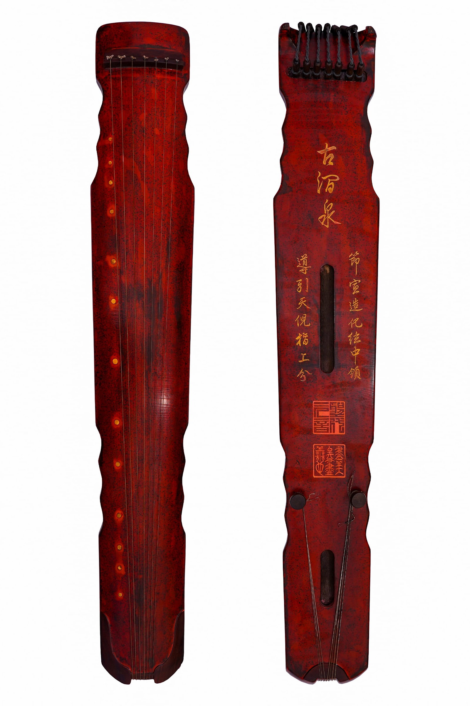 THE "GUJIAN QUAN" ANCIENT ZITHER IN THE STYLE OF ZHONGNI OF THE MING DYNASTY: L:120cm W:20cm This is a seven-string Luoxia-style guqin, coated entirely with cinnabar red lacquer covered with natural aged crackle lines. Its sides adopt the classic undulating silhouette of Luoxia