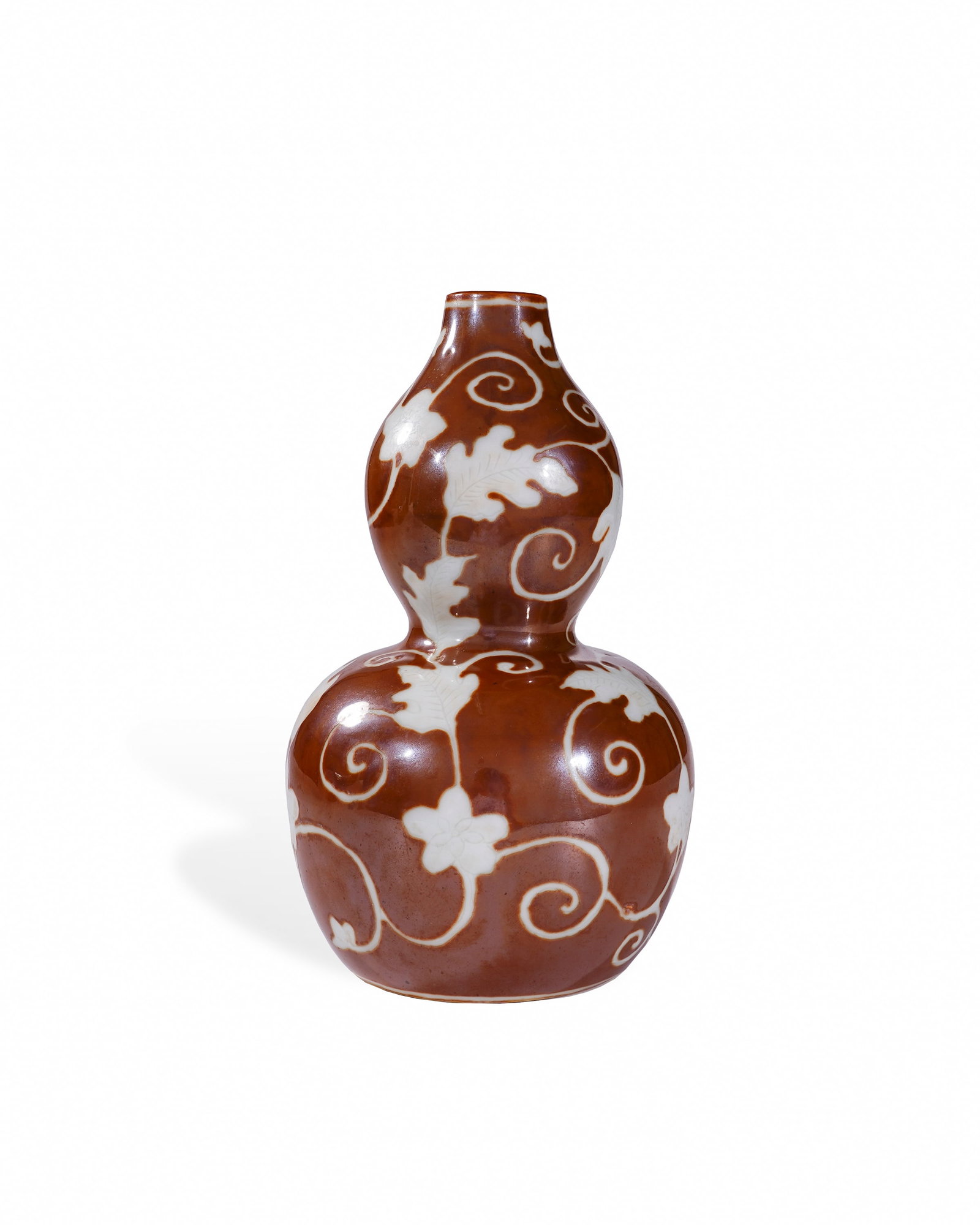 MING HONGWU COILED GOURD VASE: L:11cm H:18cm Gourd sounds identical to "blessing and fortune" in Chinese, symbolizing complete luck and prosperity; endless floral vines represent eternal vitality and lasting wealth. This elegant an