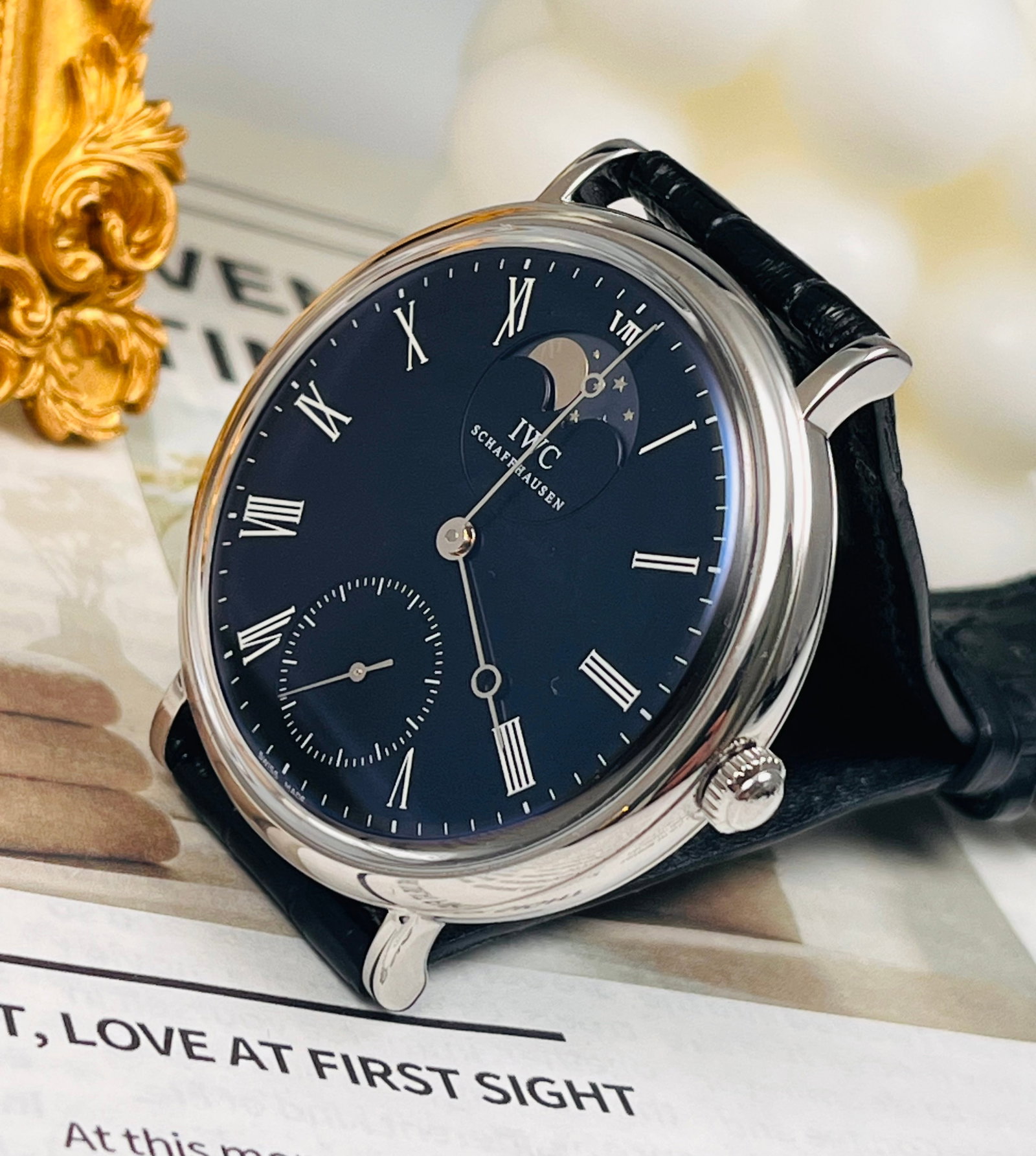 IWC. REISSUE COLLECTION WATCHES: Classic Patek Philippe Moon Phase Watch, 46mm Steel Case, Black Roman Numeral Dial, Manual-Winding Movement, 46-Hour Power Reserve