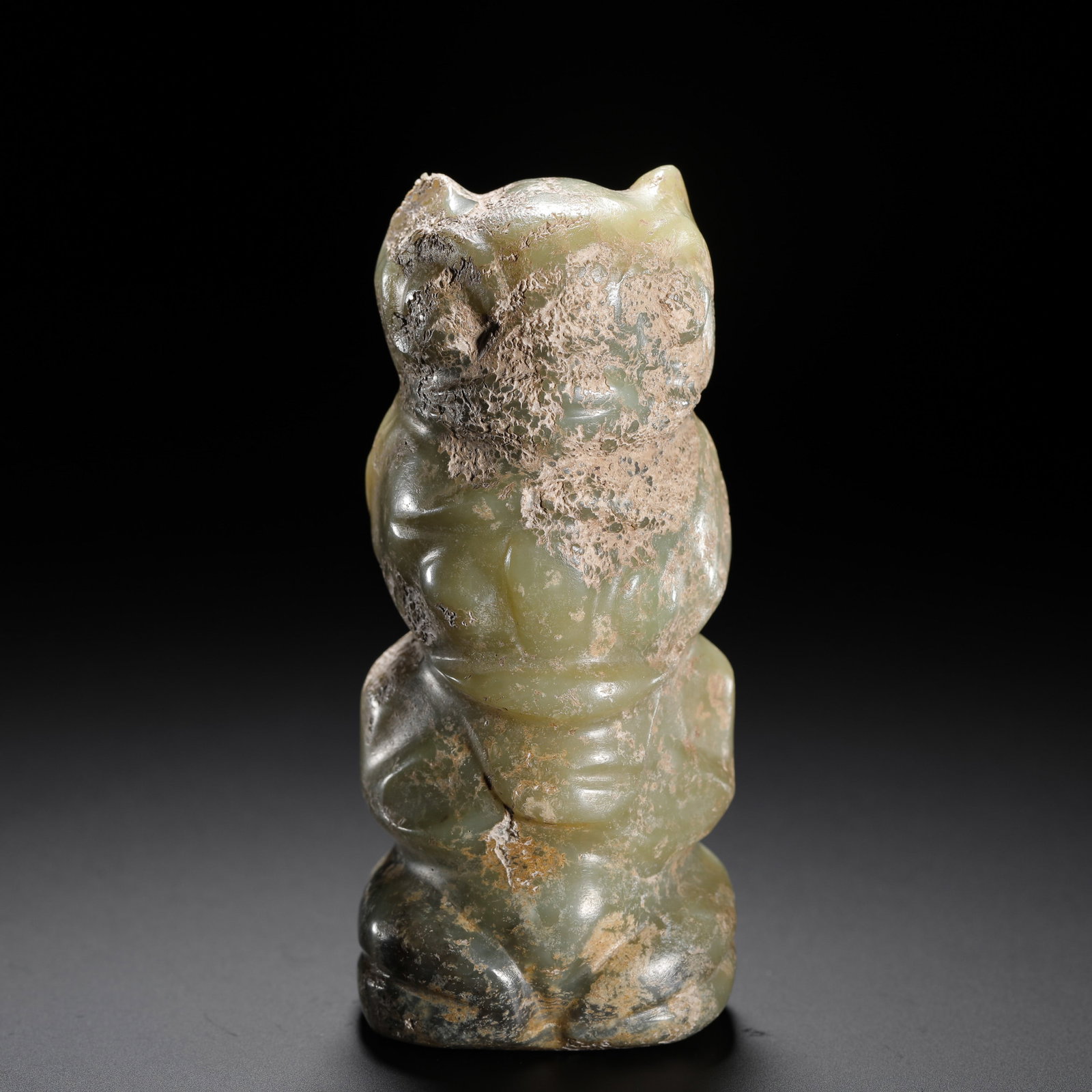 RED MOUNTAIN CULTURE JADE OWL: H:10.3cm W:4.6cm Weight:330g Hongshan green jade owl, primitive round carving with soil patina, an ancient ritual jade ornament