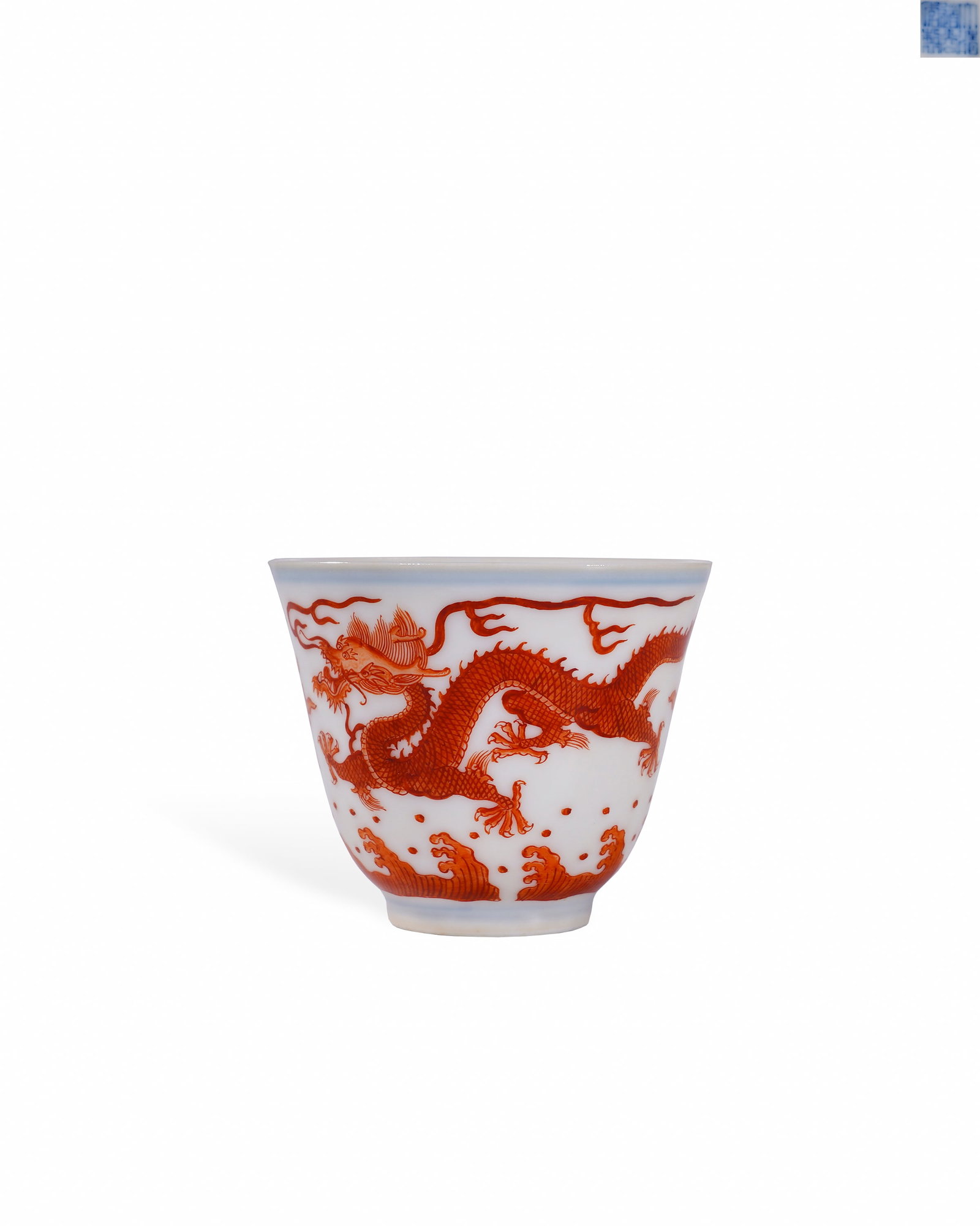 QING DAOGUANG ALUM RED DRAGON-PATTERNED CUP: L:6cm H:5cm This is an imperial porcelain cup of Qing Dynasty in bell shape, with flared rim, tapering wall and short ring foot. It is made of thin fine clay covered with translucent glossy white glaz