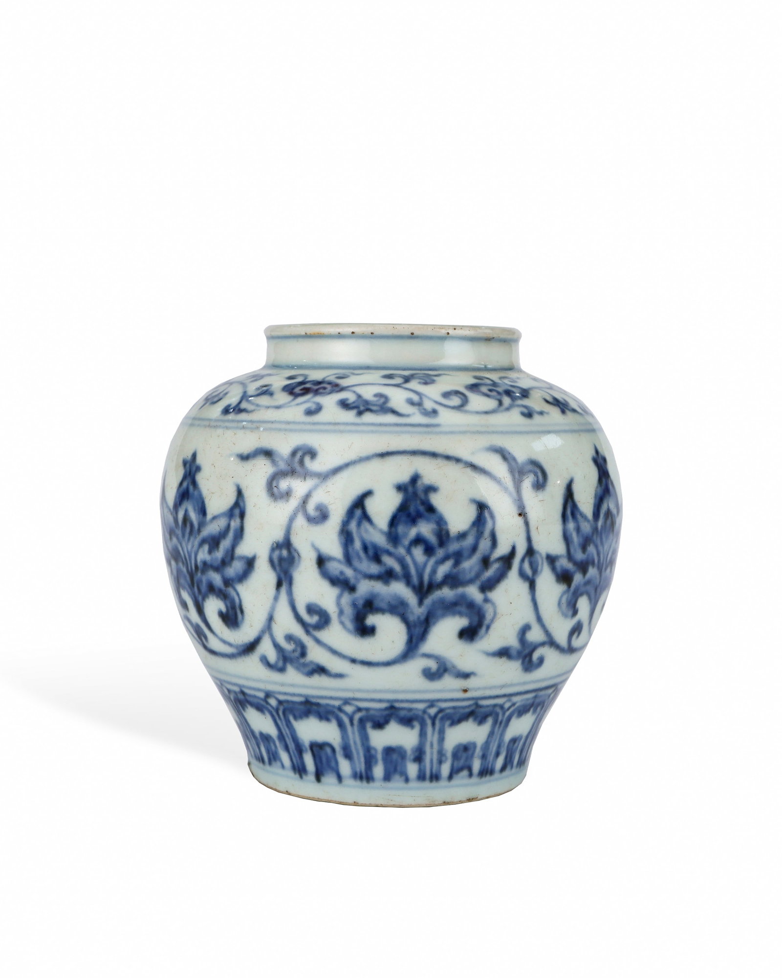 MING DYNASTY BLUE AND WHITE LOTUS PATTERN JAR: H:11.3cm W:10.5cm This is a folk blue-and-white storage jar of Ming Dynasty, with short straight mouth, full plump shoulder and tapering lower belly supported by shallow ring foot. It is covered with 