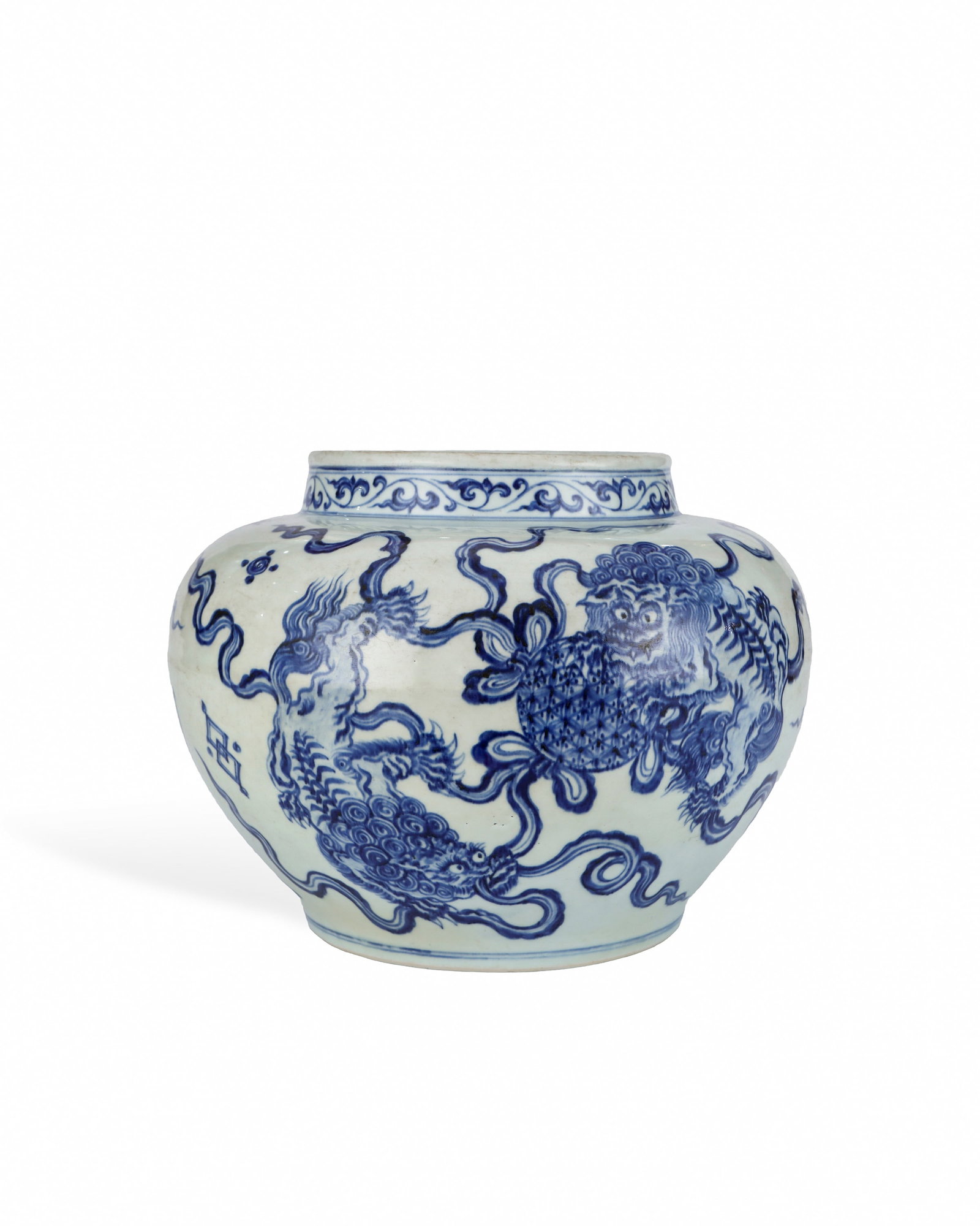 BLUE AND WHITE DOUBLE LION PLAYING BALL PATTERN JAR OF THE MING DYNASTY: H:23cm W:30.5cm This is a large blue-and-white jar of Ming Dynasty, with short straight mouth, broad shoulder, plump round belly and tapering lower body supported by shallow ring foot. It is covered w