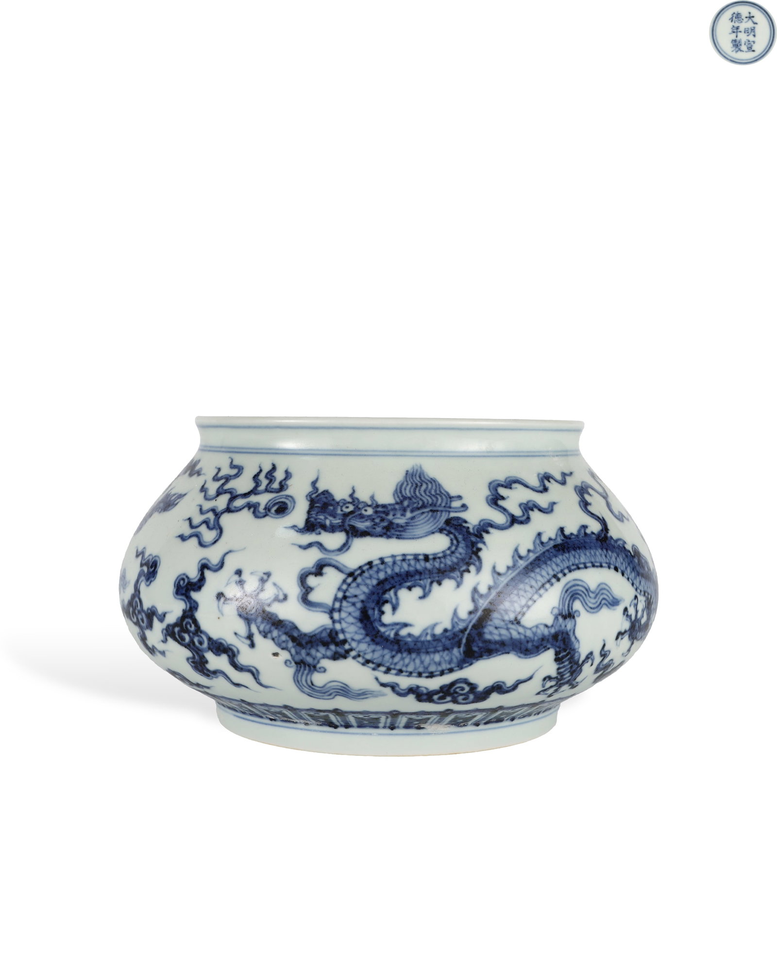 XUANDE BLUE AND WHITE CLOUD DRAGON PATTERN FISH WASH OF THE MING DYNASTY: H:12.8cm W:23cm This is an imperial blue-and-white stationery washer of Xuande reign Ming Dynasty, with contracted mouth, plump belly and ring foot shaped like a fishing basket. The whole vessel is pa