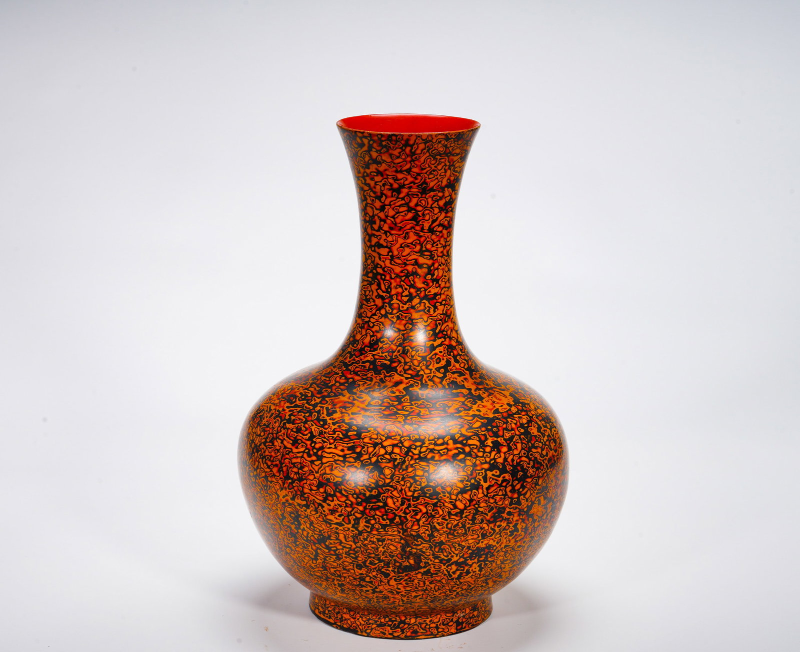 WANLI OF THE MING DYNASTY, RHINOCEROS SKIN LACQUERED SPHERICAL VASE: Height:36cm (14.17in) Width:25cm (9.84in) Weight:1120g(2.47lb)The vase features long neck and globular belly, interior painted vermilion lacquer. Surface decorated with natural flowing orange-yellow