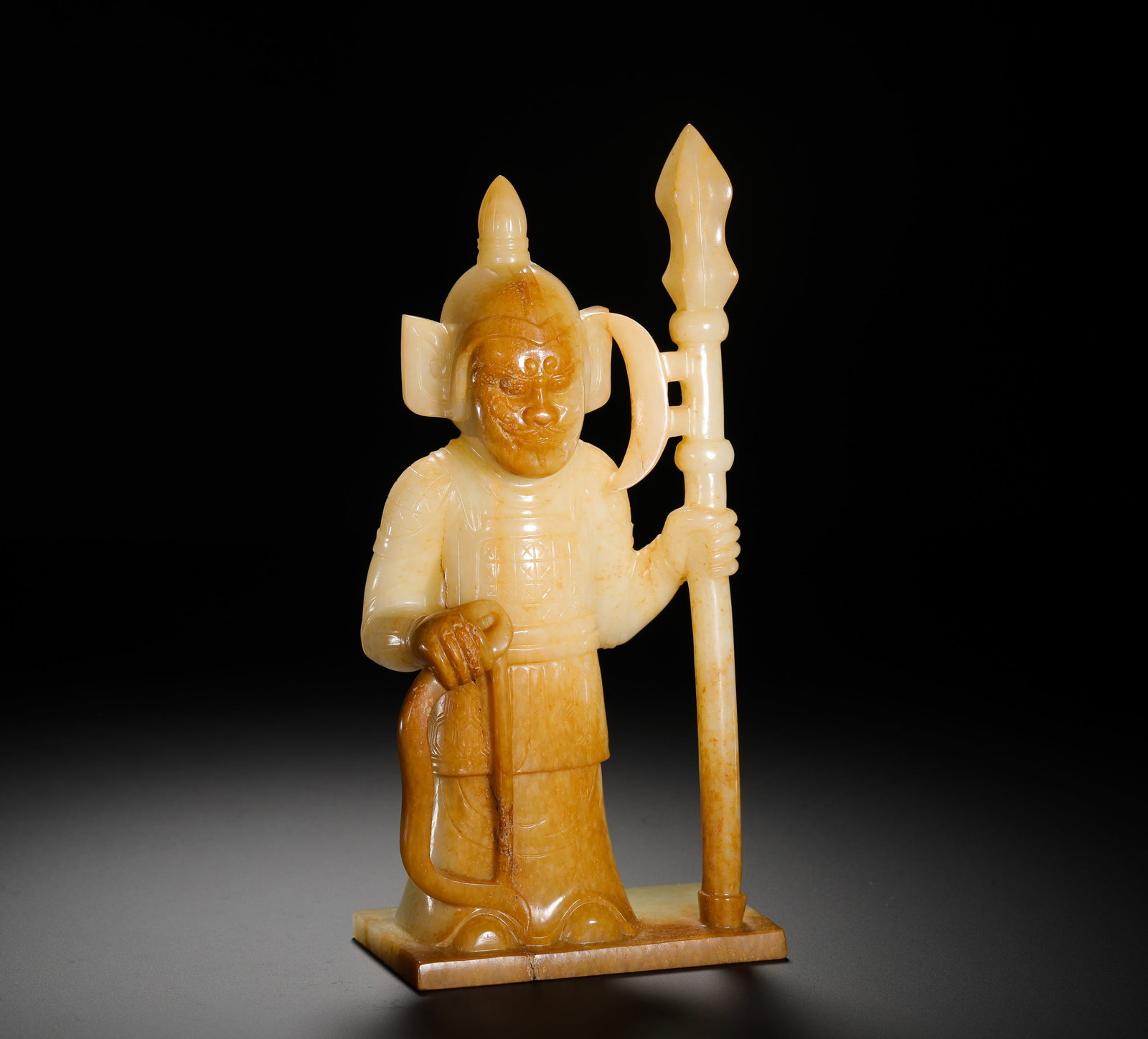 A STANDING STATUE OF A DIVINE GENERAL FROM HETIAN JADE OF THE TANG DYNASTY: Height:19cm (7.48in) Width:9cm (3.54in) Weight:740g(1.63lb)Ancient jade standing guardian deity ornament carved from single whole jade. Armored warrior holding spear with solemn facial features, full 