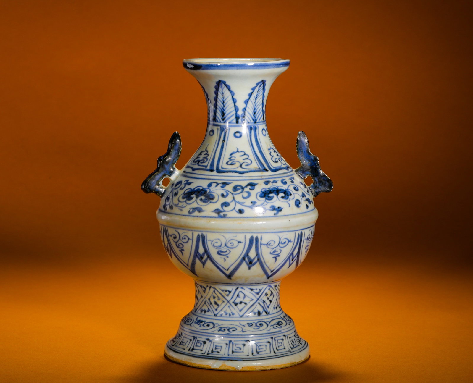 YUAN DYNASTY BLUE AND WHITE DOUBLE-BAR-EAR HIGH-FOOTED ORNAMENTAL VASE: Height:21cm (8.27in)Width:14cm (5.51in)Weight:810g(1.79lb)Antiqueblueandwhitehigh-footvase, twinbathandles, auspiciousdoublefortunedecorativeporcelain.