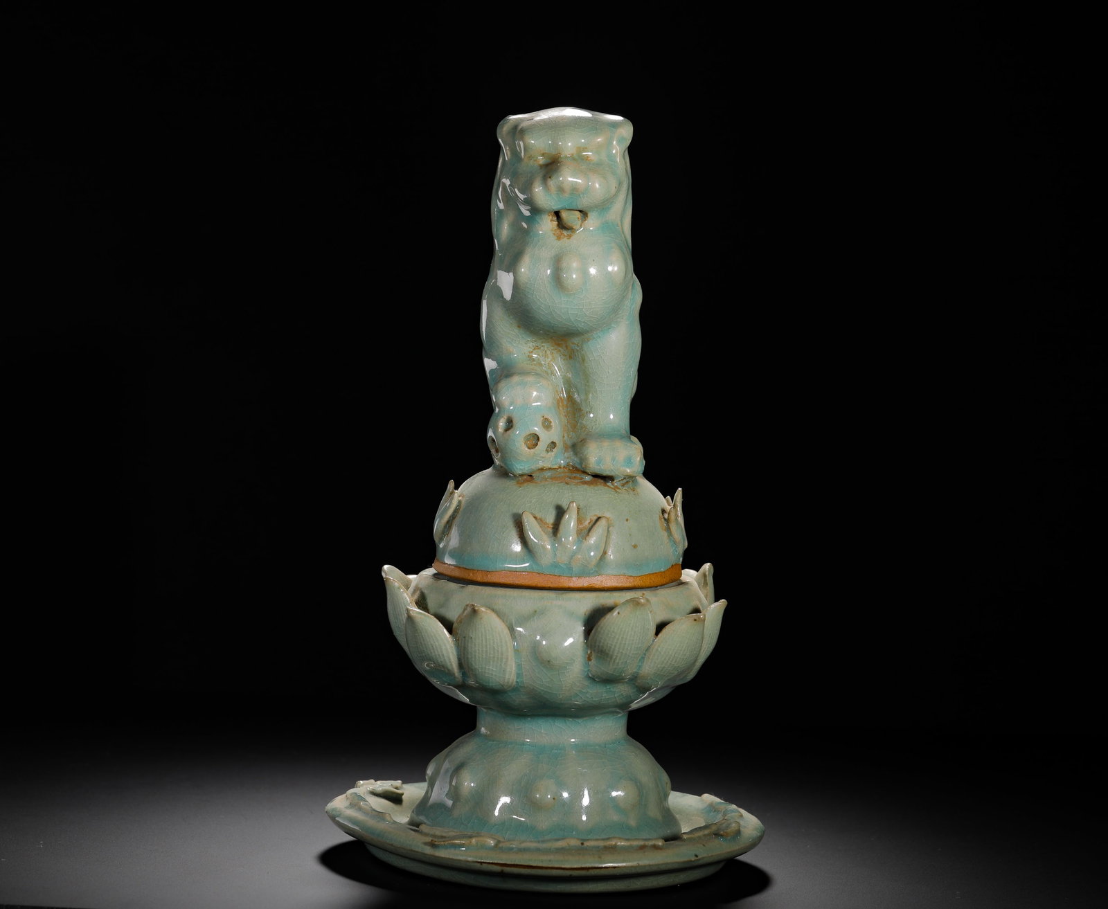 SONG DYNASTY LONGQUAN KILN POWDER BLUE GLAZE AUSPICIOUS BEAST LION BUTTON LOTUS PETAL INCENSE BURNER: Height:31cm (12.20in) Width:18cm (7.09in) Weight:2090g(4.61lb)Longquan celadon censer with lion finial and lotus reliefs, fully covered soft pinkish celadon crackle glaze. Three-piece structure: lid, 
