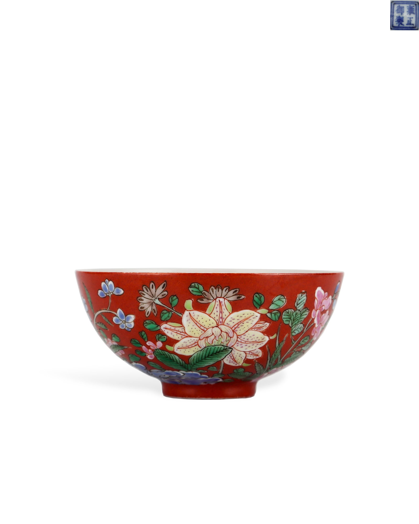 A CORAL RED GROUND POLYCHROME BOWL MADE BY EMPEROR YONGZHENG: H:3.5cm W:7.3cm Imperial famille rose bowl of Yongzheng reign, Qing Dynasty, with flared mouth, curved belly and delicate small ring foot, elegant light shape. The exterior is fully covered with coral