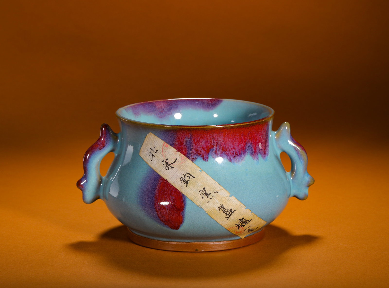 A ROSE-PURPLE DOUBLE-EARED INCENSE BURNER FROM JUN KILN OF THE NORTHERN SONG DYNASTY: Height:10cm (3.94in)Width:20cm (7.87in)Weight:730g(1.61lb)AntiqueNorthernSongJunkilnfish-earcenser, rarerosepurplekilntransmutationritualporcelain.