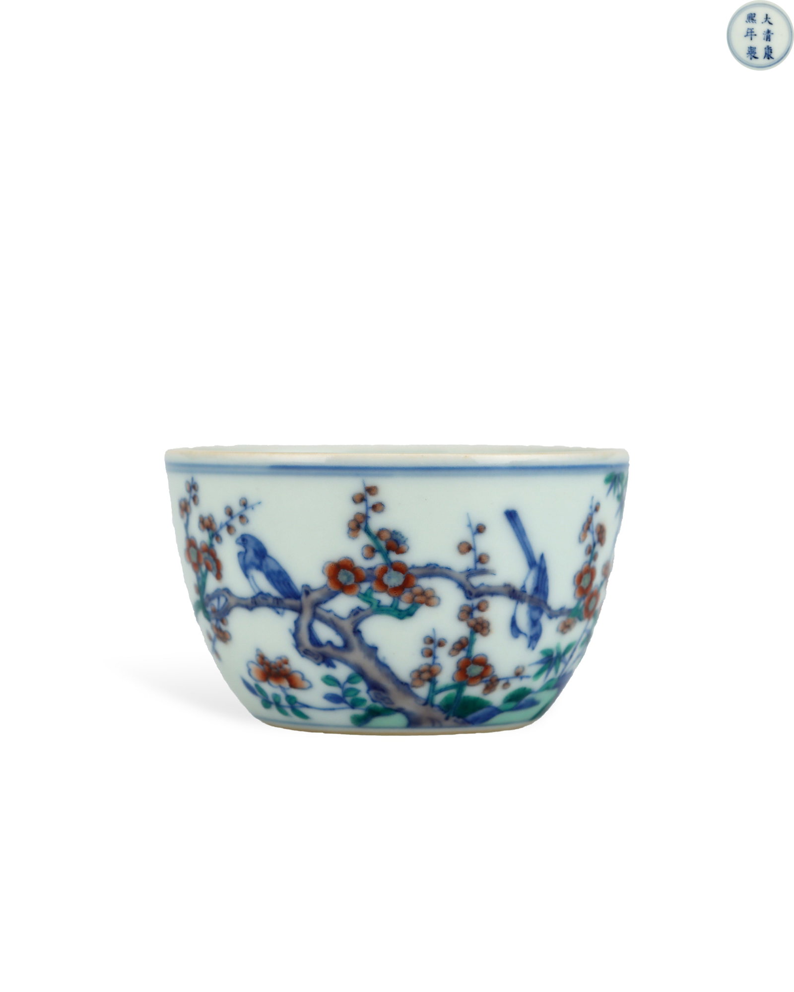 QING DYNASTY KANGXI DOUCAI HAPPY EYEBROWS PATTERNED RECLINING FOOT CUP: H:4.7cm W:7.3cm Vertical regular cobalt script mark "Made in Kangxi Reign of Great Qing" sits within double blue circles at the base. Doucai requires two firing stages: high-temperature underglaze out