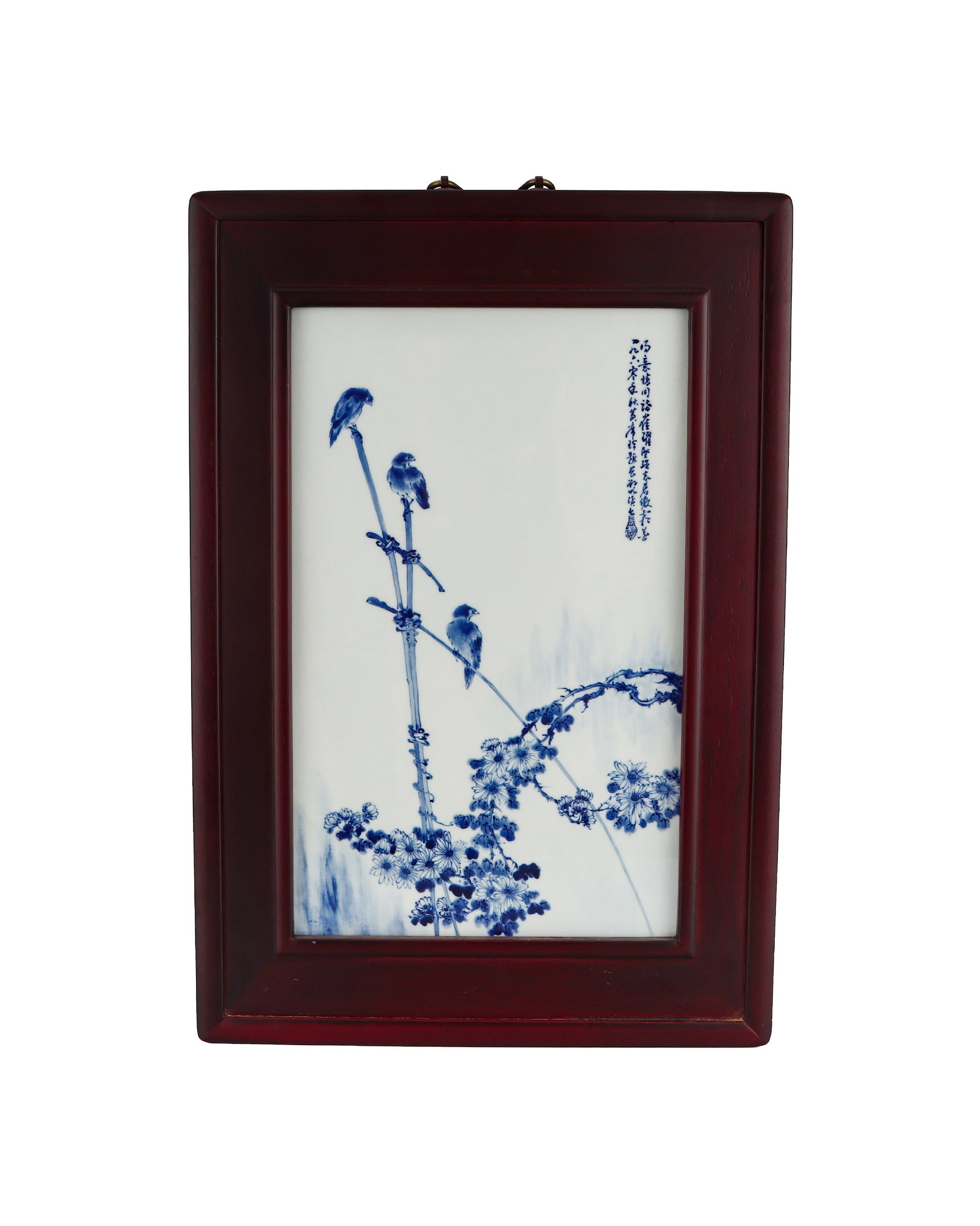 BLUE AND WHITE BAMBOO SPARROW AUTUMN CHRYSANTHEMUM PORCELAIN PLATE, 1960: H:41.5cm W:25.5cm This is an early People??s Republic underglaze blue flower-and-bird porcelain plaque with a mahogany frame. It depicts slender bamboo stalks, autumn chrysanthemums and three sparrows