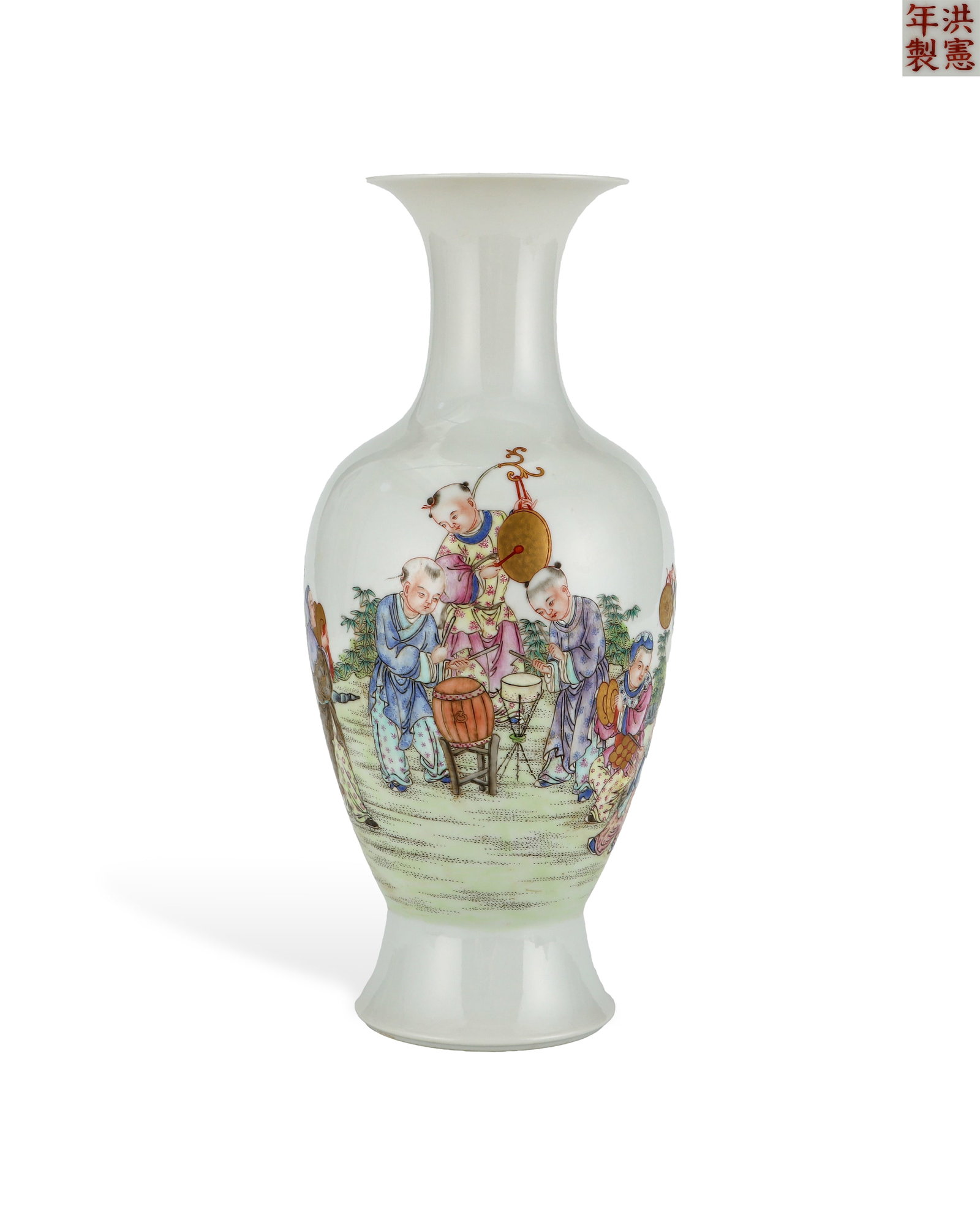 A PINK AND WHITE PORCELAIN VASE OF GUANYIN IN INFANT PLAY AND MUSIC MADE BY HONG XIAN: H:28.2cm W:12.5cm Vertical vermilion regular script mark "Made in Hongxian Reign" is inscribed on the base. Hongxian porcelain is imperial imitation official porcelain of early Republican era, inherit
