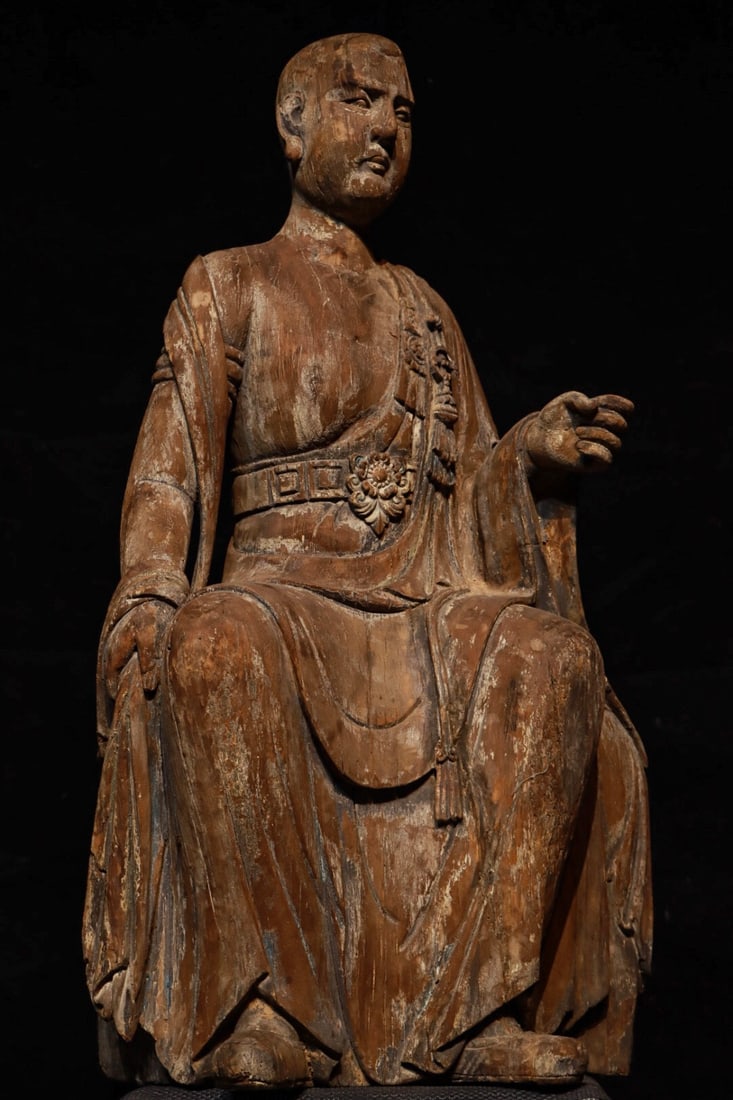 A SEATED STATUE OF THE ARHAT MADE OF NANMU WOOD FROM THE MING DYNASTY (1 of 9)
