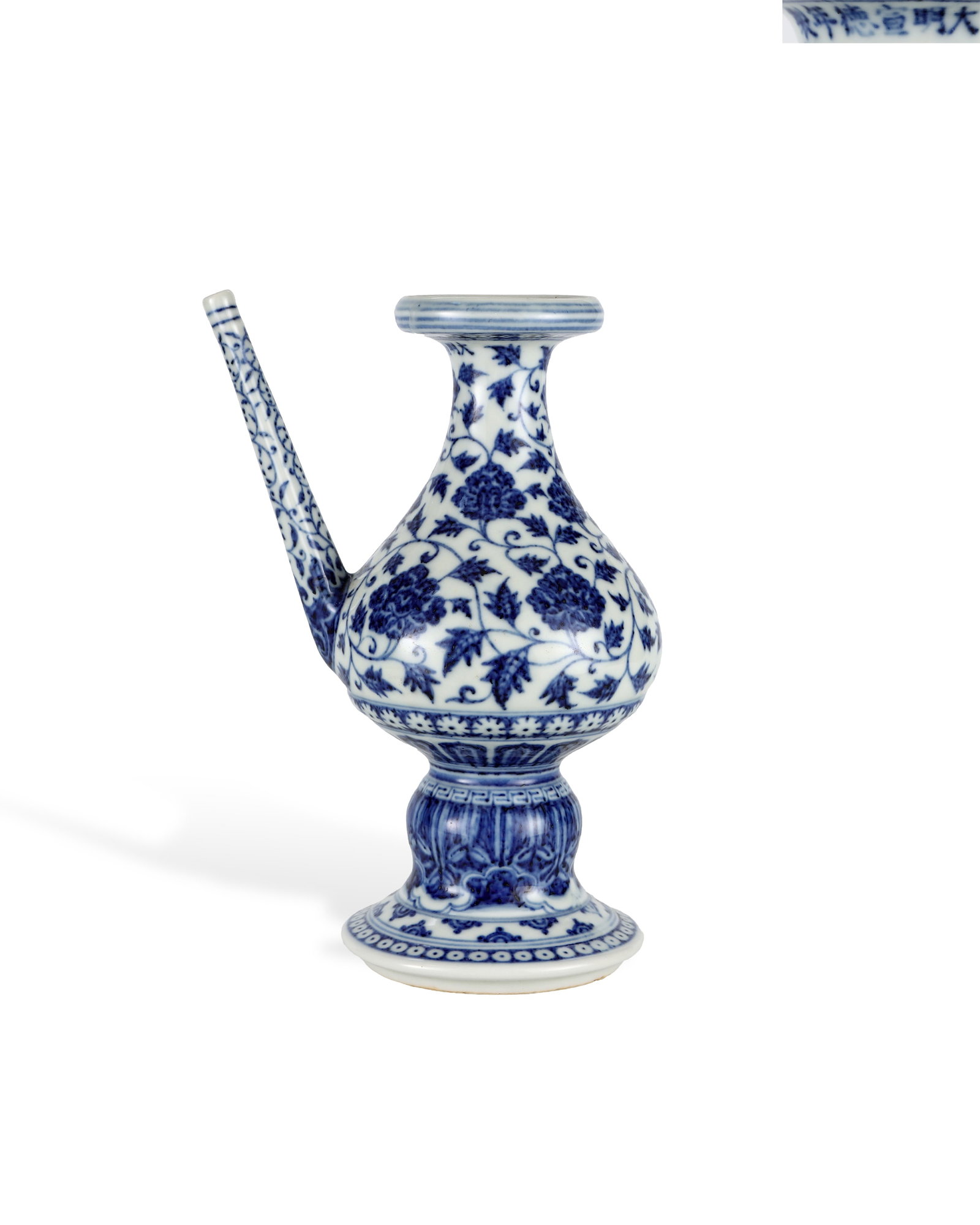MING DYNASTY XUANDE BLUE AND WHITE ENTWINED PEONY POT: H:22.8cm W:16cm Official Ming Xuande blue-and-white penba kundika, an ancient porcelain ritual vessel for hand cleansing in Buddhist worship. It features flat dish mouth, thin straight spout, gourd-sh