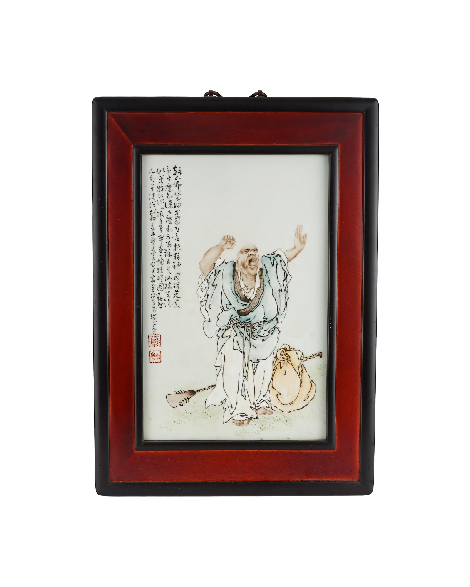 PORCELAIN PLATE OF THE FIGURE OF THE MONK IN THE BAG IN PASTEL COLORS OF THE REPUBLIC OF CHINA ERA: H:38cm W:24.2cm This is a Republic of China light crimson figure porcelain plaque with a mahogany outer frame. It depicts the cloth bag Maitreya monk with his sack and monk??s staff beside him, vivid 