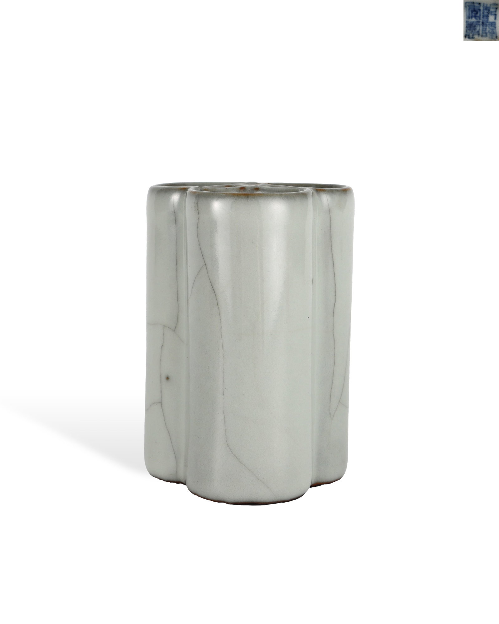 QING DYNASTY QIANLONG IMITATION OFFICIAL GLAZE THREE-PIECE PEN HOLDER: H:9.5cm W:6.5cm Official Qing Qianlong triple-jointed brush pot covered in Song Guan imitation crackle glaze for holding writing brushes. Combined by three integrated cylinders, the outer surface is c