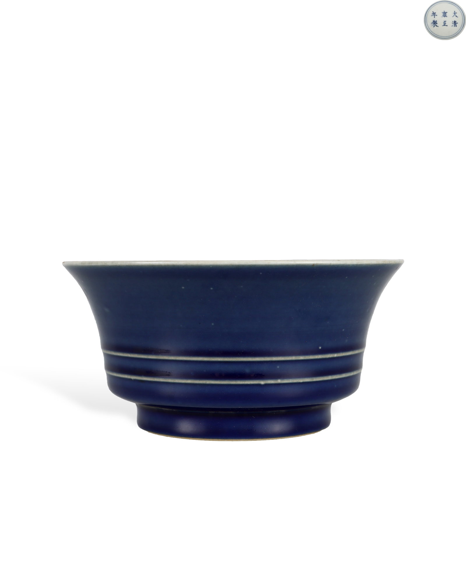 QING DYNASTY YONGZHENG JILAN GLAZE STRING PATTERN FOLDED RIM WASH: H:8.7cm W:17.7cm Six-character regular script blue-and-white mark "Made in the Yongzheng Reign of the Great Qing" is vertically inscribed within double blue circles on the white glazed base.Sacrificia