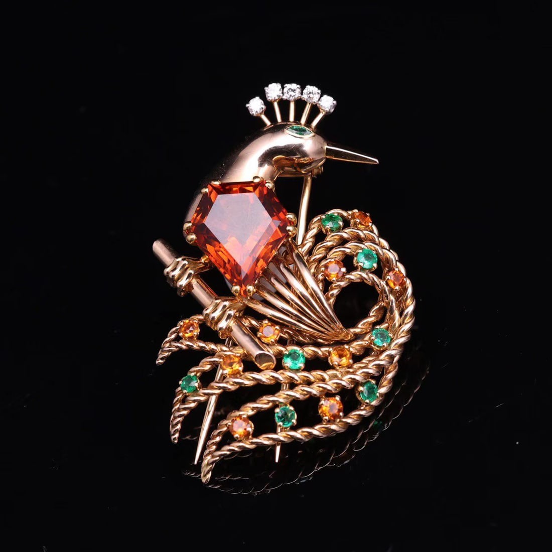 BOUCHERON BIRD OF PARADISE BROOCH: Rare style Diamond crown Topaz Body Emerald tail Abstract design Signature Buscheron Paris No. 13327 Eagle Head RS Royal workshop weight 18.8g size 52.8x33mm
