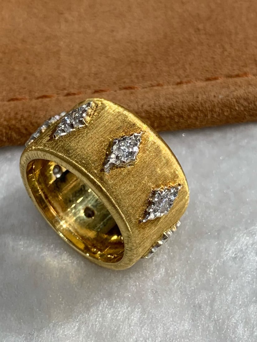 MARIO BUCCELLATI, 18K TWO-TONE GOLD WEAVE ENGRAVED GOLD BRUSHED WIDE RING: Weight: 10.9g, Size: 54