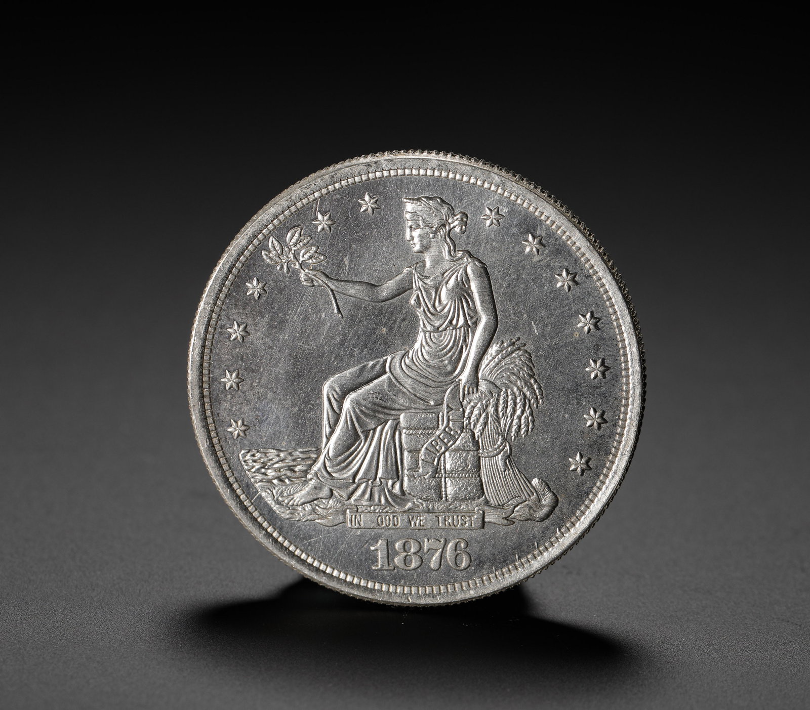1876 US TRADE SILVER DOLLAR: D:3.9cm (1.54in) Weight:27g (0.06lb)A silver coin issued by the United States specifically for Asian trade. The 1876 issue is a pivotal year in the series, coinciding with the U.S. Centennial, carryin
