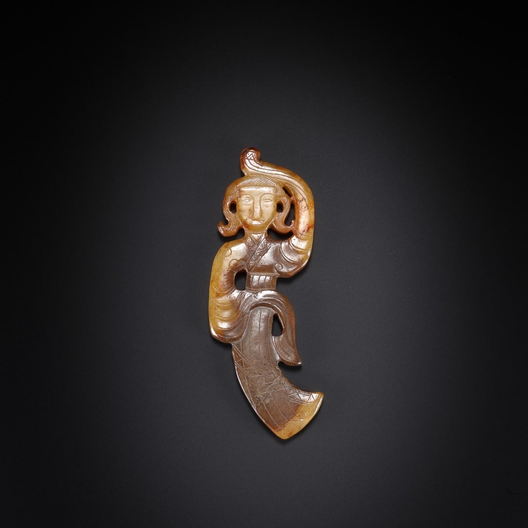 HAN DYNASTY HETIAN JADE PENDANT FOR DANCERS: Long:8.8cm(3.46in), Width:2.7cm(1.06in), Thick:0.6cm(0.24in), Weight:28g (0.062lb)Ancient jade dancing figure pendant. Carved from Hetian jade permeated with tawny patina. This openwork plaque depicts