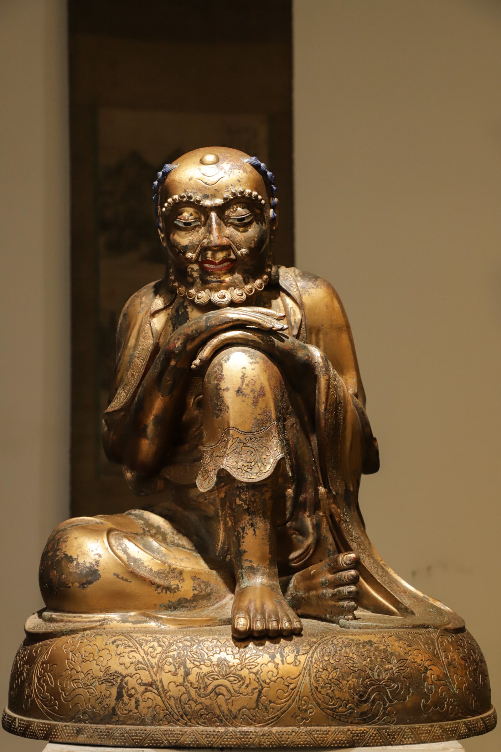 A GILDED BRONZE STATUE OF BODHIDHARMA IN THE QING DYNASTY (1 of 9)