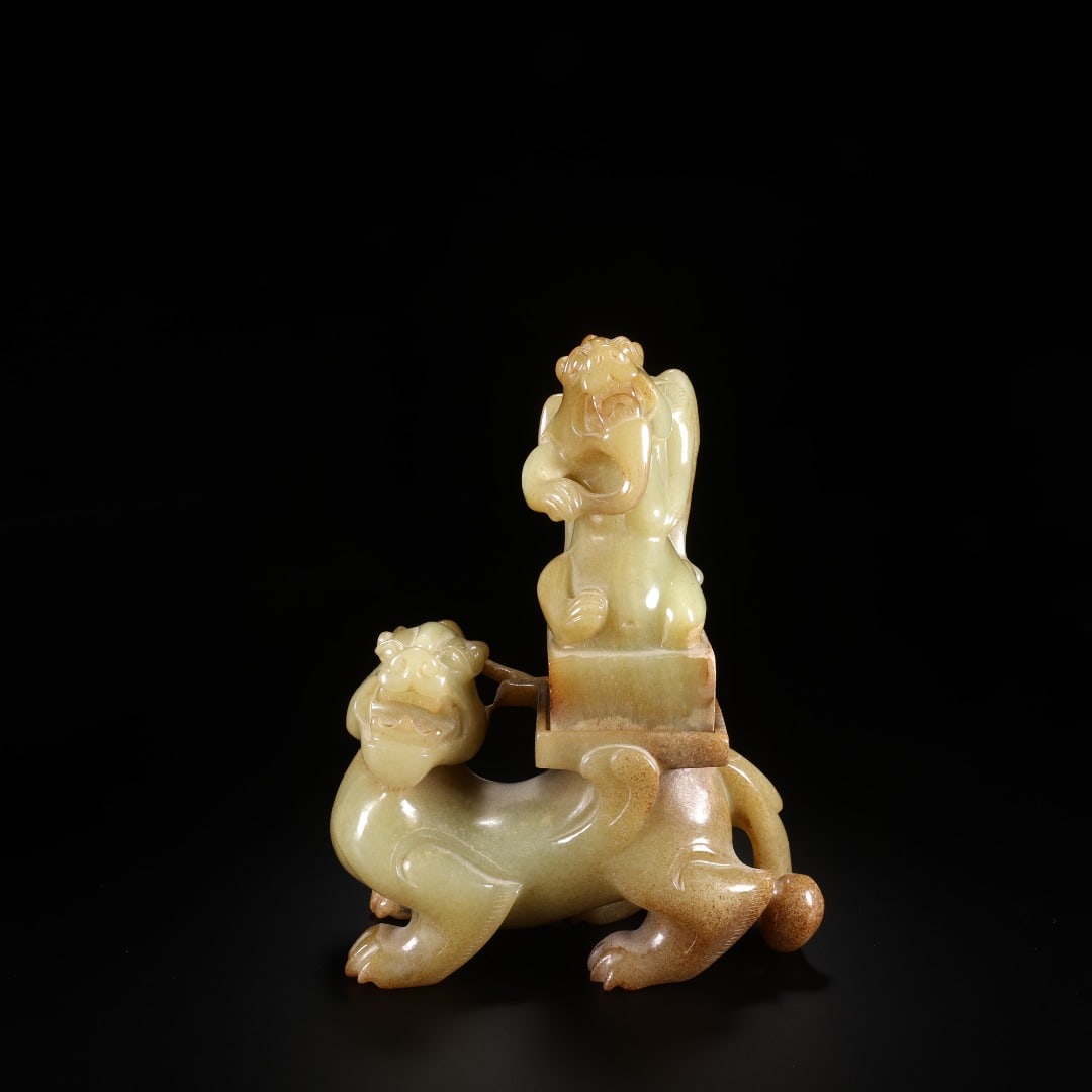HAN HETIAN JADE BEAST PACK SEAL: Long:11cm(4.33in), Width:5.2cm(2.05in), Height:15cm(5.91in), Weight:849g (1.872lb)Carved from mild Hetian yellow jade covered with natural light brown patina. The whole work is integrated carving. A c