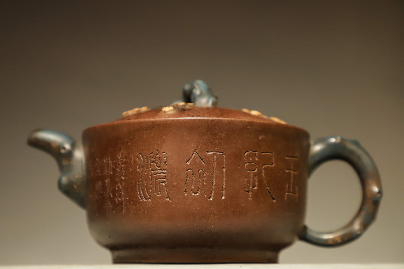 BOWL PLUM PURPLE CLAY TEAPOT: Long:18cm(7.09in), Width:11.5cm(4.53in), Height:8cm(3.15in)The teapot is mainly made of purple clay. The spout, handle and knob are sculpted as plum branches with blue clay. Plum blossoms are decorate
