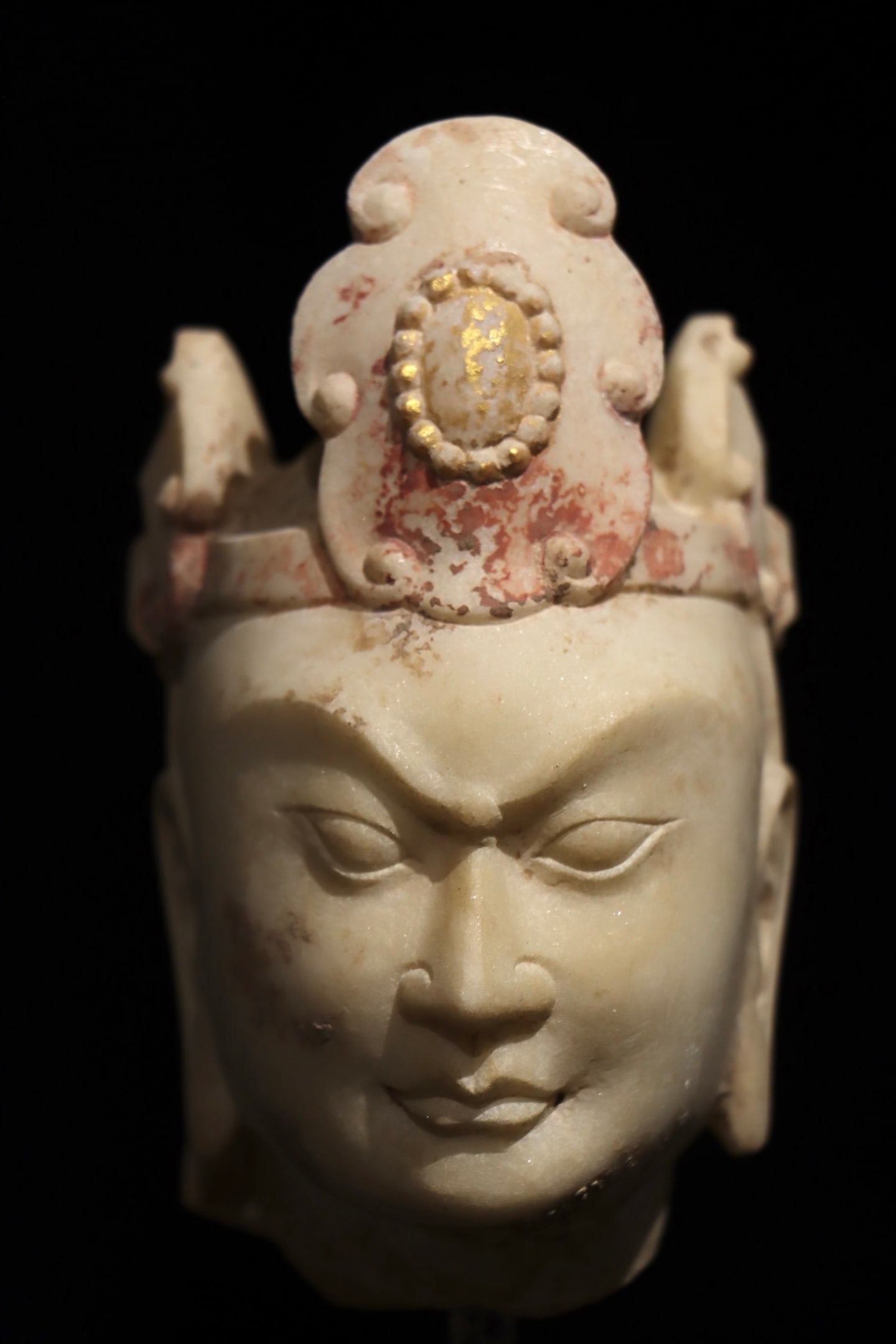 A WHITE MARBLE STRONGMAN'S HEAD FROM THE NORTHERN WEI DYNASTY (1 of 7)