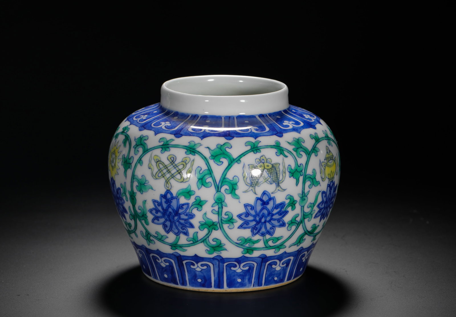 MING CHENGHUA DOUCAI LOTUS-SHAPED EIGHT TREASURES PATTERNED HEAVEN CHARACTER JAR: H:12cm (4.72in) D:15cm (5.91in) Weight:510g (1.12lb) This is an imperial porcelain jar from the Chenghua period, decorated with the Eight Buddhist Treasures in doucai enamels, and marked with the char