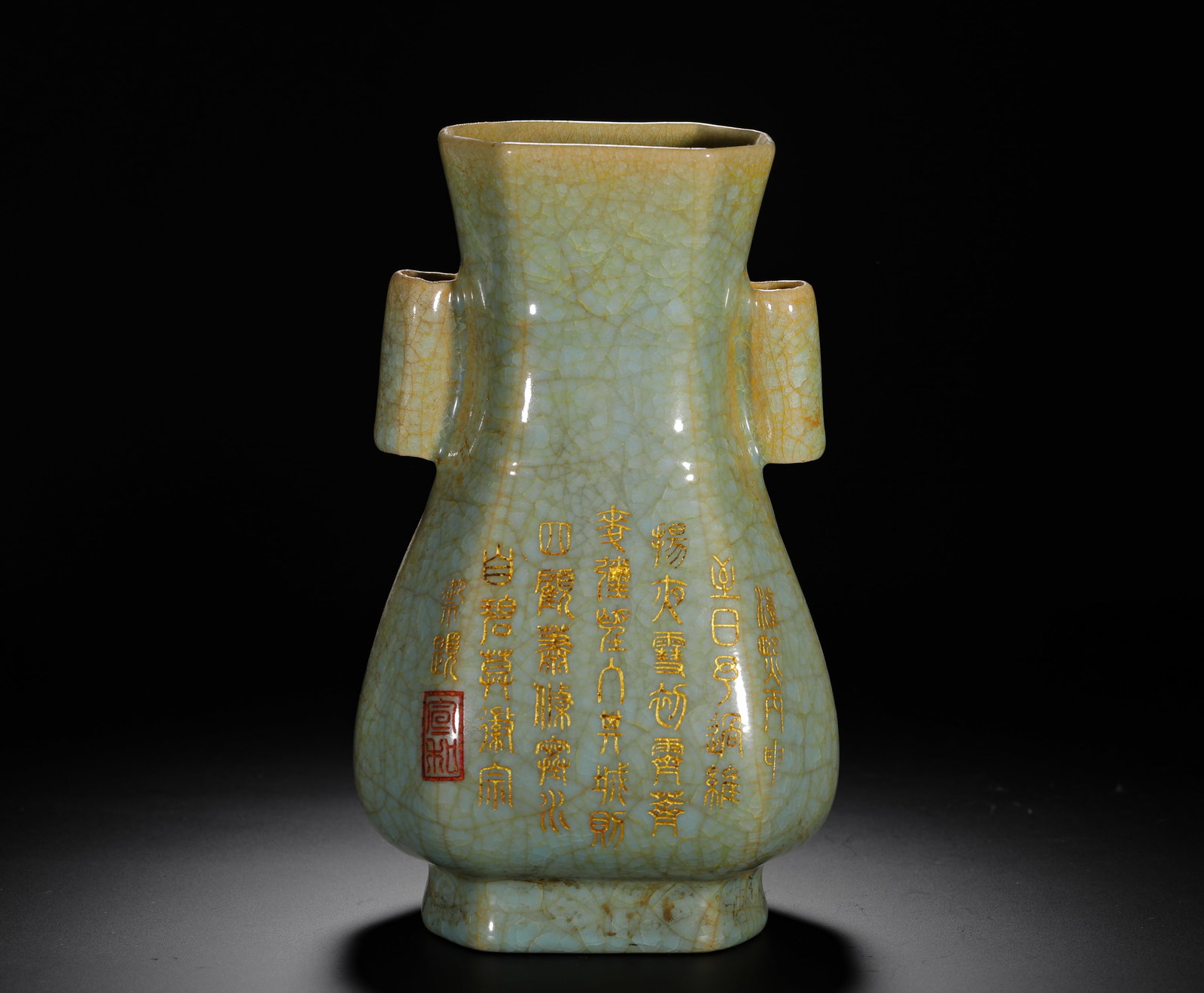 A SONG DYNASTY RU KILN CELADON VASE WITH IMPERIAL POEMS ENGRAVED ON IT: H:22cm (8.66in) W:13cm (5.12in) Weight:960g (2.12lb)This is a Song/Yuan Dynasty Ru-style porcelain vase with a hexagonal body and tubular handles, later inscribed with a gilded imperial poem, exemplif