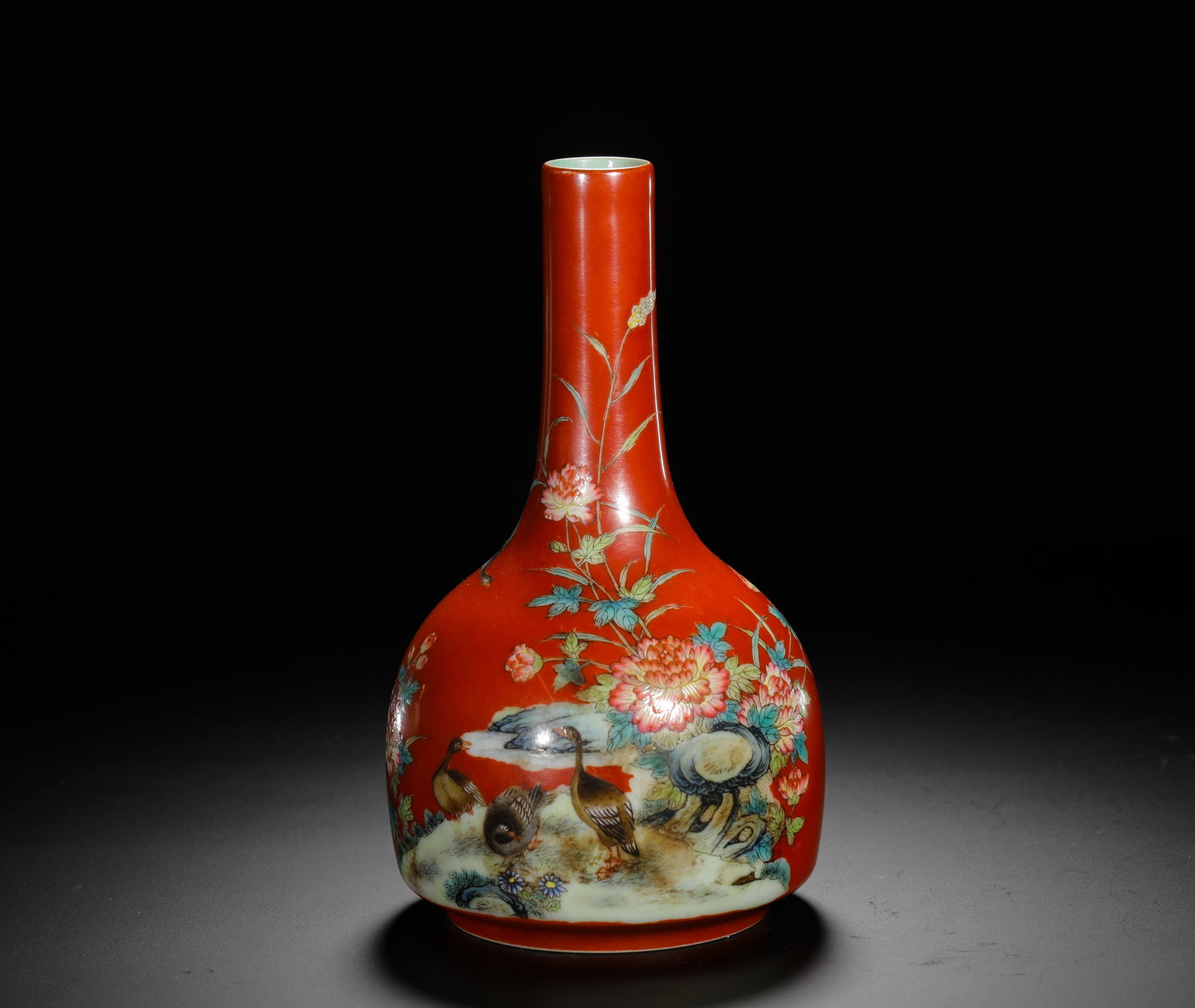 QING QIANLONG CORAL RED GROUND PINK FLOWER-AND-BIRD PATTERNED STRAIGHT-NECKED VASE: H:18.5cm (7.28in) D:11cm (4.33in) Weight:530g (1.17lb) This is an imperial famille rose porcelain vase from the Qianlong period, with a coral red ground decorated with flowers and birds, exemplifying 