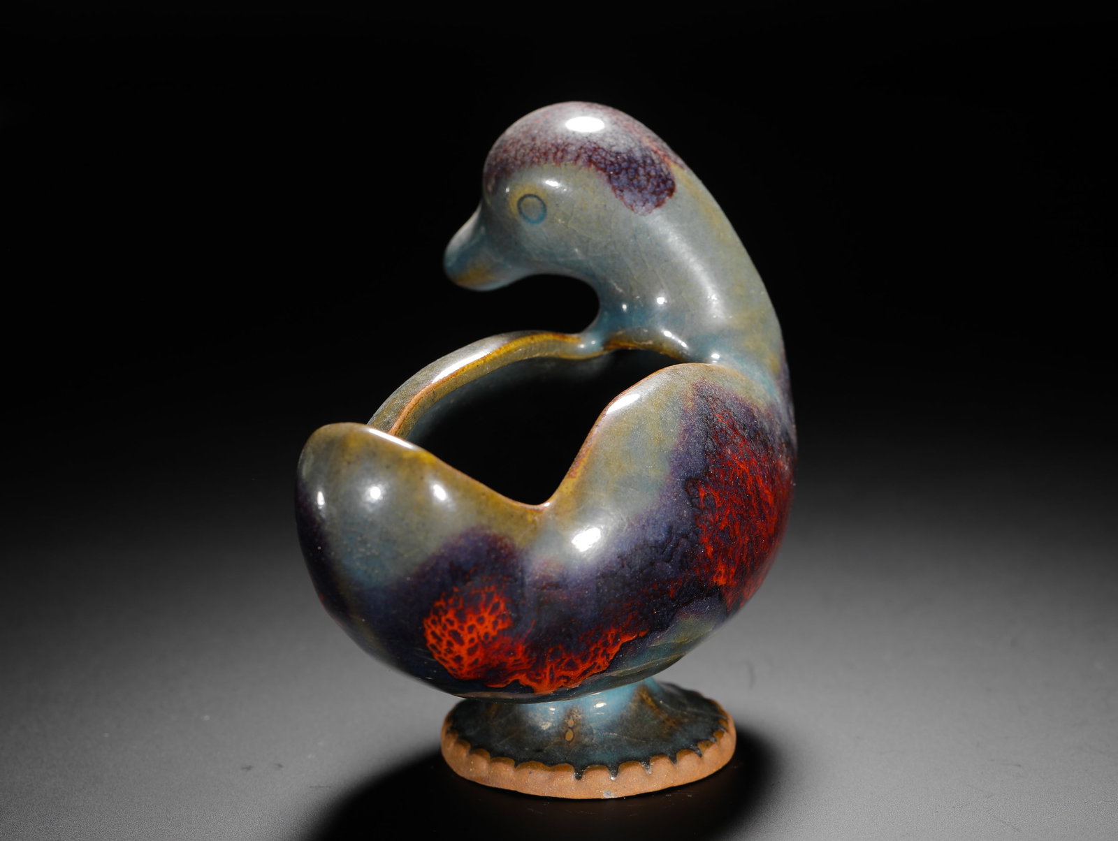 A HIGH FOOT WATER BOWL IN THE SHAPE OF A DUCK FROM THE QING DYNASTY'S JUN KILN (1 of 7)