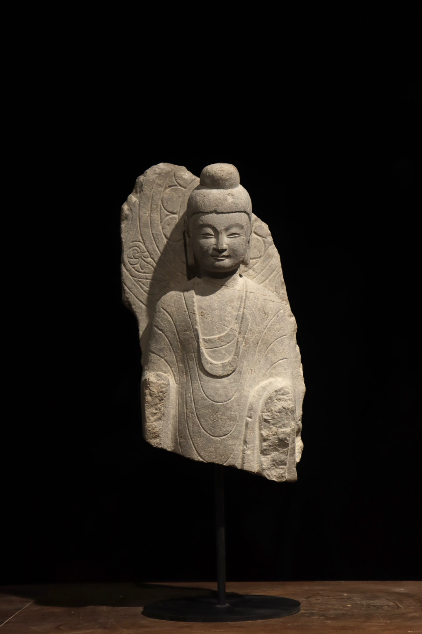 A HALF-LENGTH STONE STATUE OF SAKYAMUNI FROM THE NORTHERN QI DYNASTY (1 of 6)