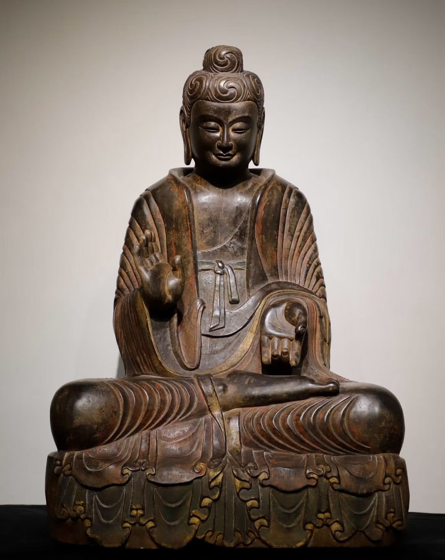 TANG DYNASTY STONE-CARVED PAINTED SEATED STATUE OF SAKYAMUNI PREACHING (1 of 9)