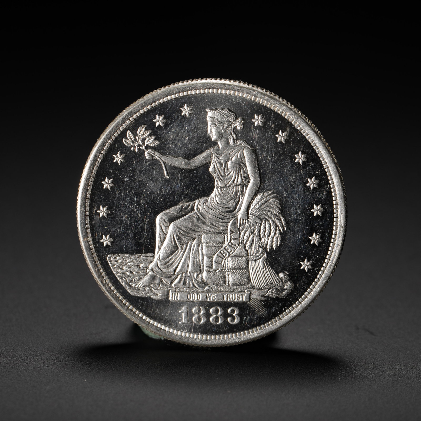1883 US TRADE SILVER DOLLAR: D:3.9cm (1.54in) Weight:27g (0.06lb) A silver coin issued by the United States specifically for East Asian trade markets. The 1883 issue is a rare late-year version of the Trade Dollar series, with a