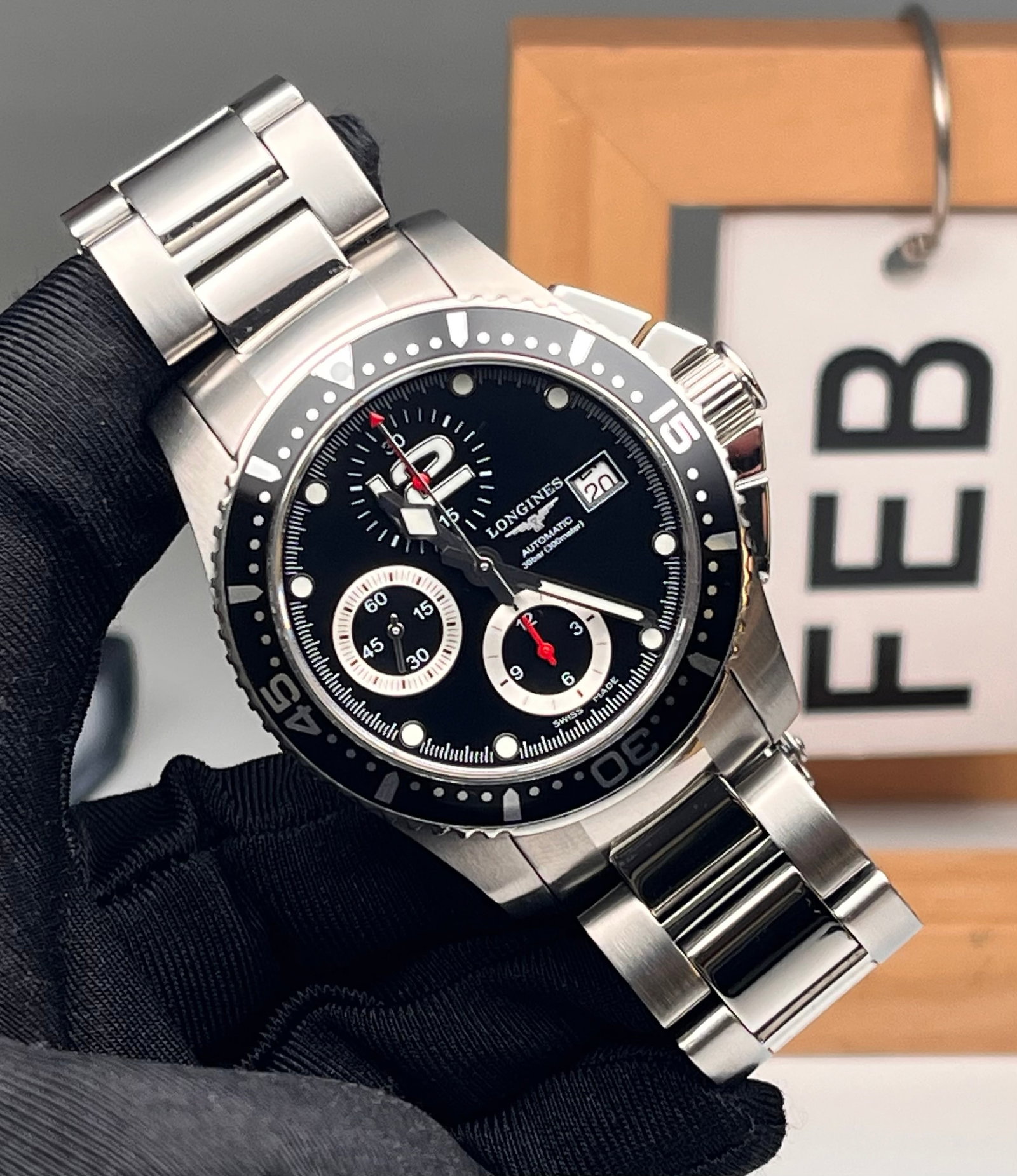 LONGINES CONQUEST COLLECTION: 41mm stainless steel case, black dial with luminescent hour markers and hands, automatic mechanical movement with 46-hour power reserve, scratch-resistant sapphire crystal glass, water-resistant up