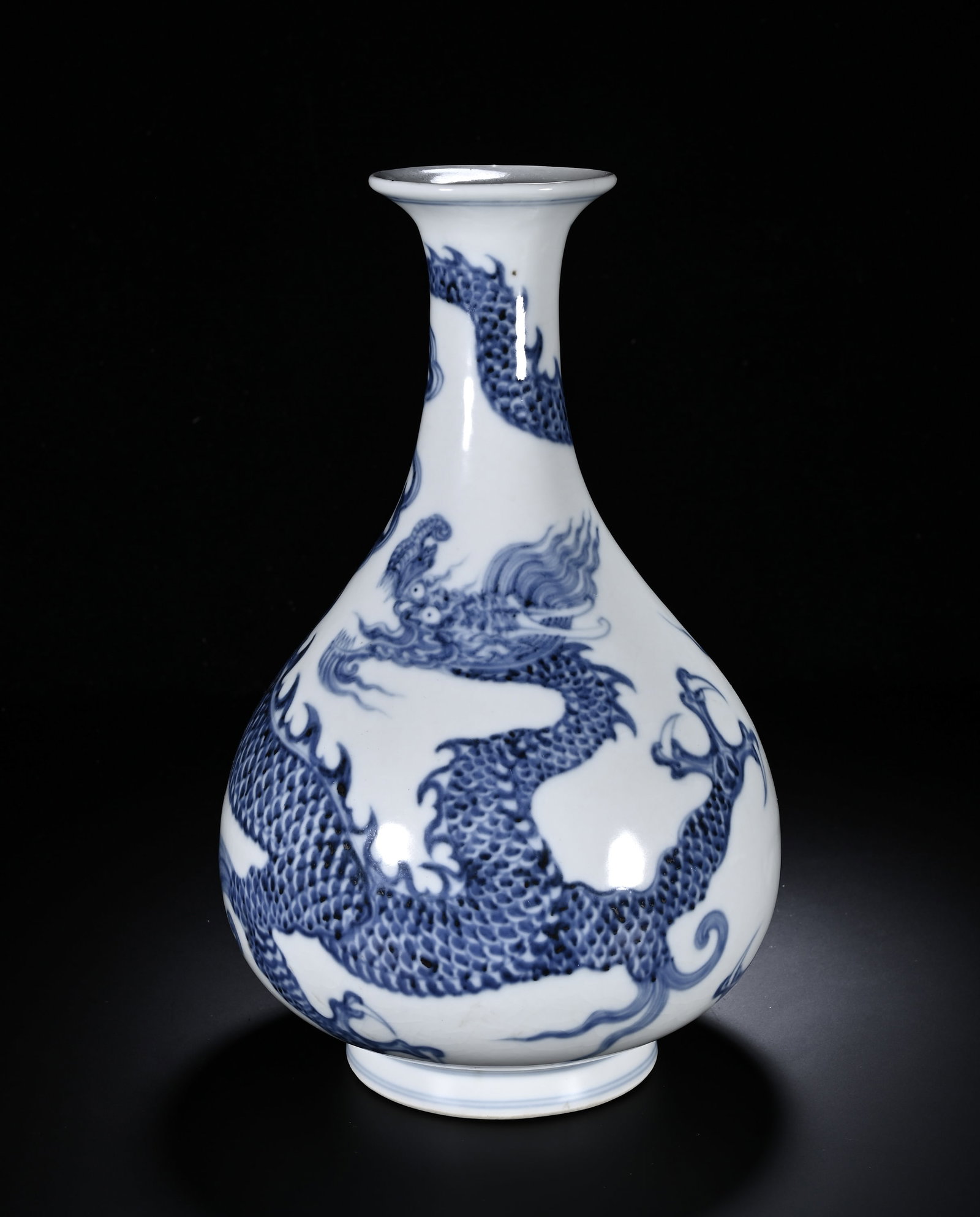 MING YONGLE BLUE AND WHITE CLOUD DRAGON PATTERN JADE HUCHUN VASE: Height:30cm (11.81in) , Diameter:16cm (6.30in) Imperial blue?and?white yuhuchun vase of Yongle reign, with flared rim, slender neck, pendulous belly and ring foot, presenting elegant soft silhouette. 