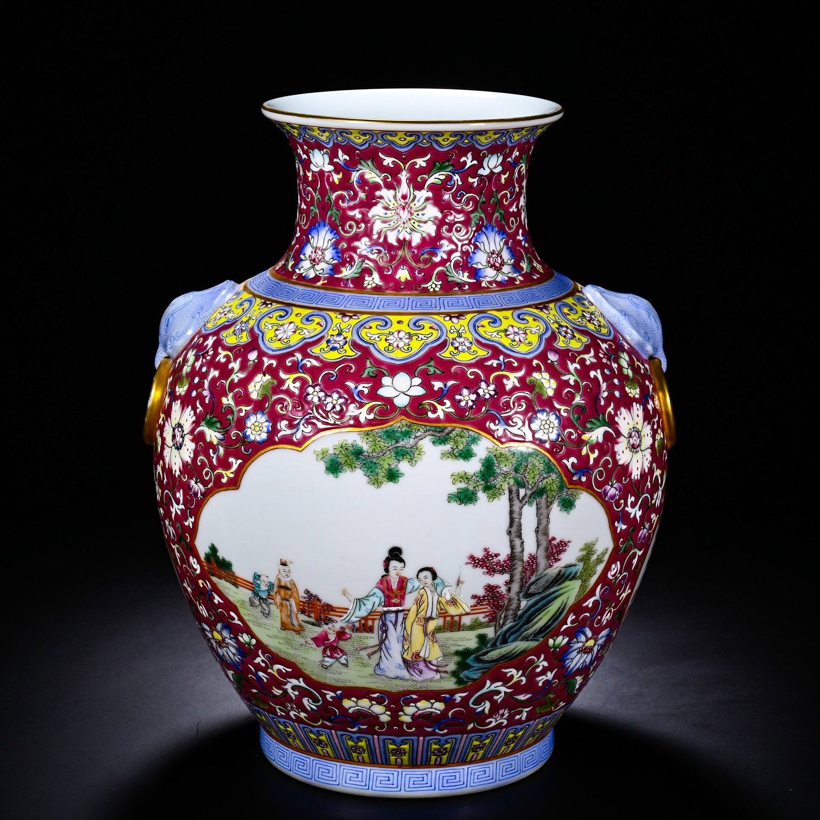 A PICTURE OF A YOUNG LADY PLAYING WITH A BEAST'S EAR HOLDING A RING VASE: Height:28cm (11.02in) , Diameter:18cm (7.09in) The vase has flared rim, broad neck, full shoulder, rounded tapering body and well?finished foot ring, fitted with a pair of animal?head ring handles at 