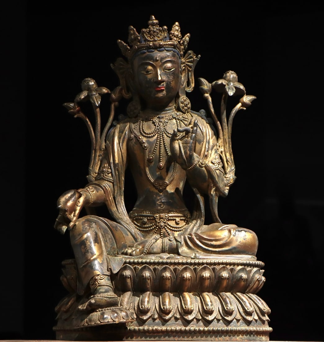 A GILDED BRONZE STATUE OF WHITE TARA FROM THE MING DYNASTY (1 of 9)