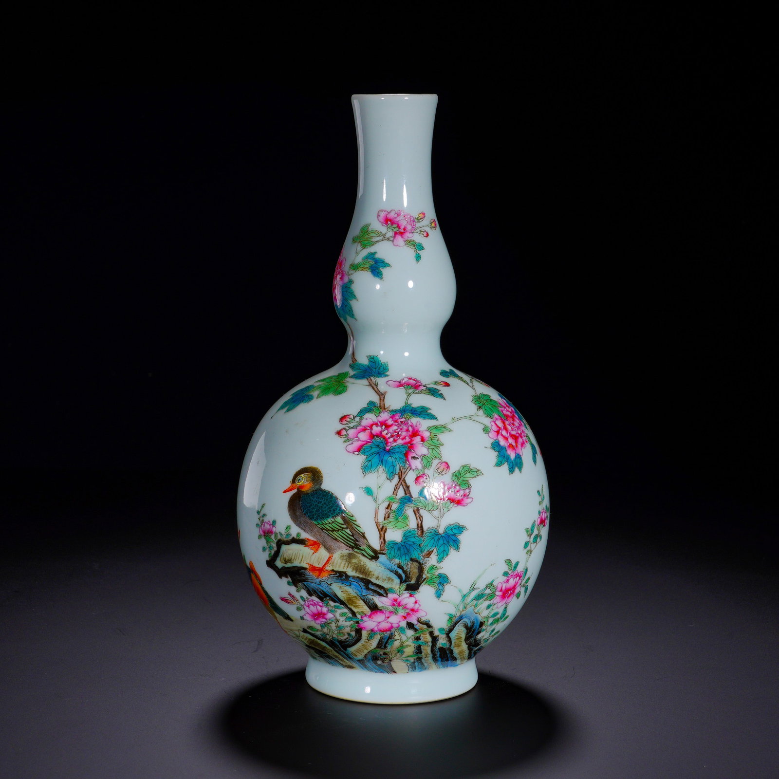 QING YONGZHENG PASTEL FLOWER, BIRD AND MANDARIN DUCK PATTERN GOURD VASE: Height:23cm (9.06in) , Diameter:13cm (5.12in) Gourd?form vase with constricted waist and ring foot, featuring elegant silhouette and lustrous milky?white glaze. The exterior is fully decorated in fami