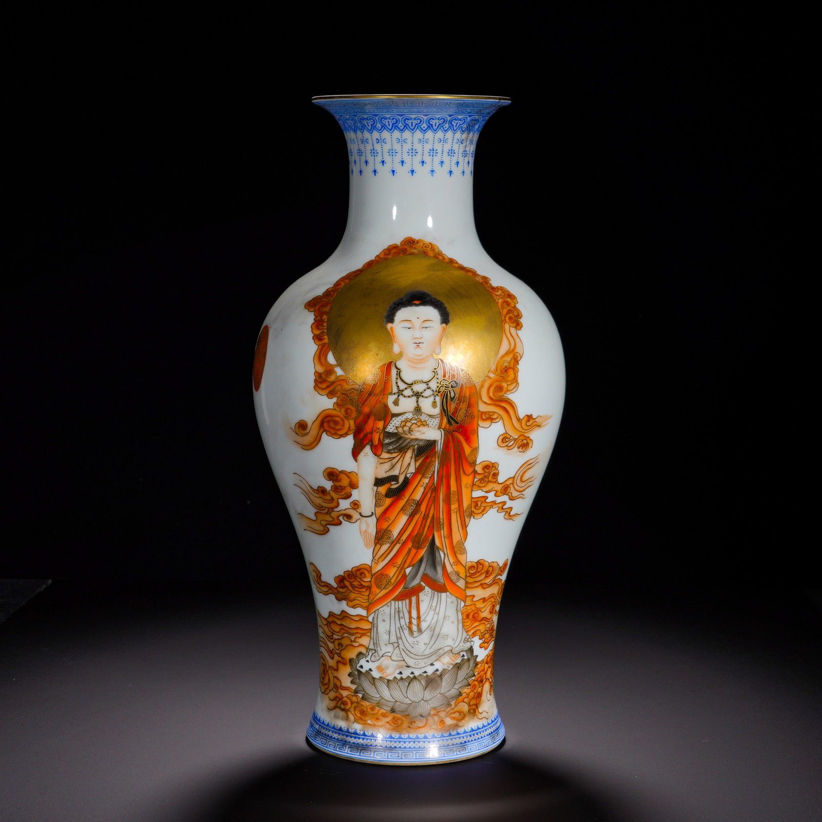 QING QIANLONG ALUM RED GILDED BUDDHA STANDING STATUE GUANYIN VASE: Height:37cm (14.57in) , Diameter:19cm (7.48in) A classic Guanyin?form vase of Qianlong reign, with flared mouth, long neck, full shoulder, tapering body and ring foot. Blue enamel geometric border
