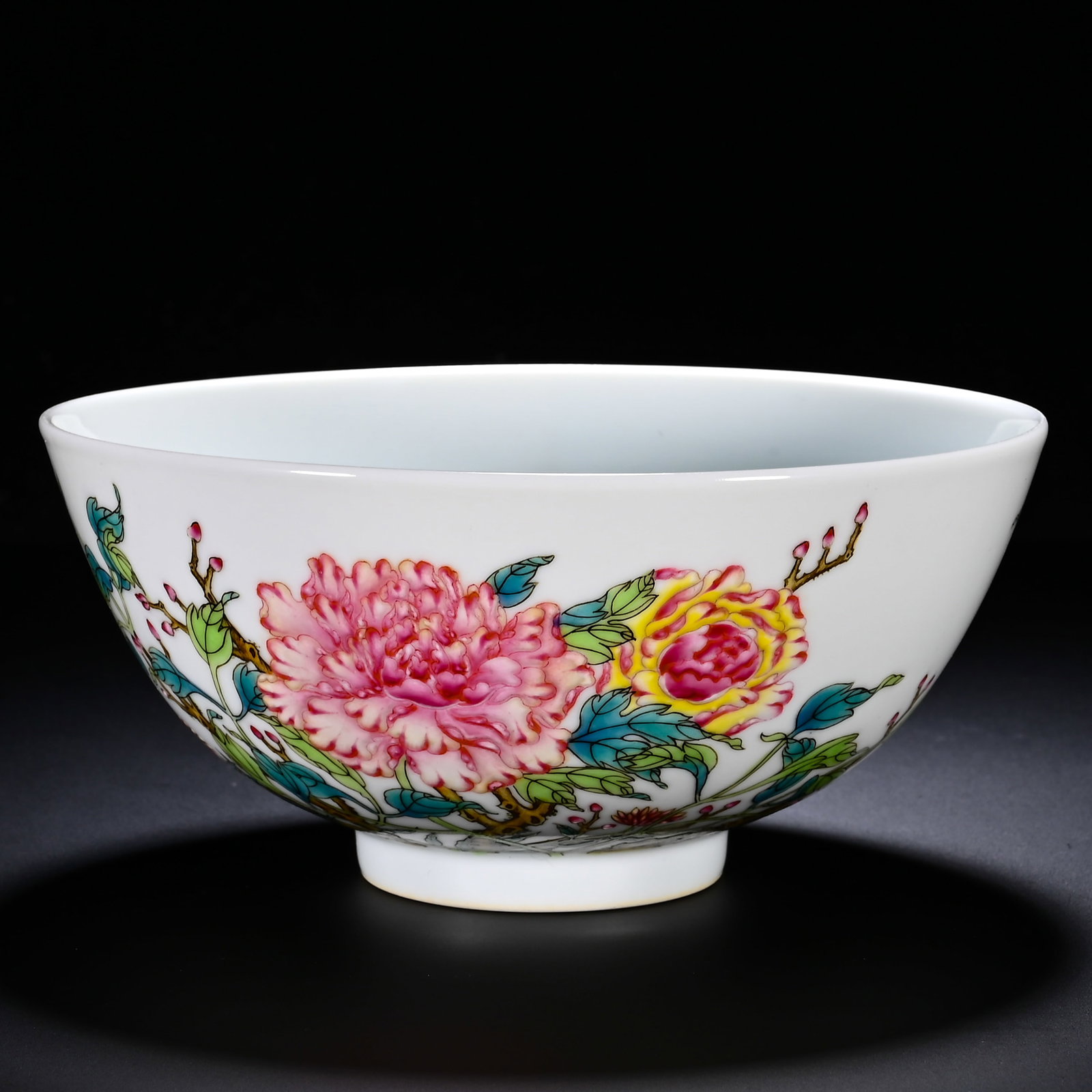 A BOWL WITH PEONY FLOWER PATTERNS IN THE YONGZHENG PERIOD OF THE QING DYNASTY: Height:6.5cm (2.56in) , Diameter:14.5cm (5.71in) Bowl with flared rim, curved belly and foot?ring, fine smooth porcelain body under bright white glaze. Exterior fully painted with famille?rose